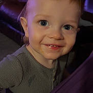Braxton joined the competition — help win amazing prizes! toddler, child, smiling, face, blue_eyes, teeth, gray_shirt, hand, indoor, living_room, couch, fabric, close_up, person, cute, young_child, happy, portrait, skin, hair