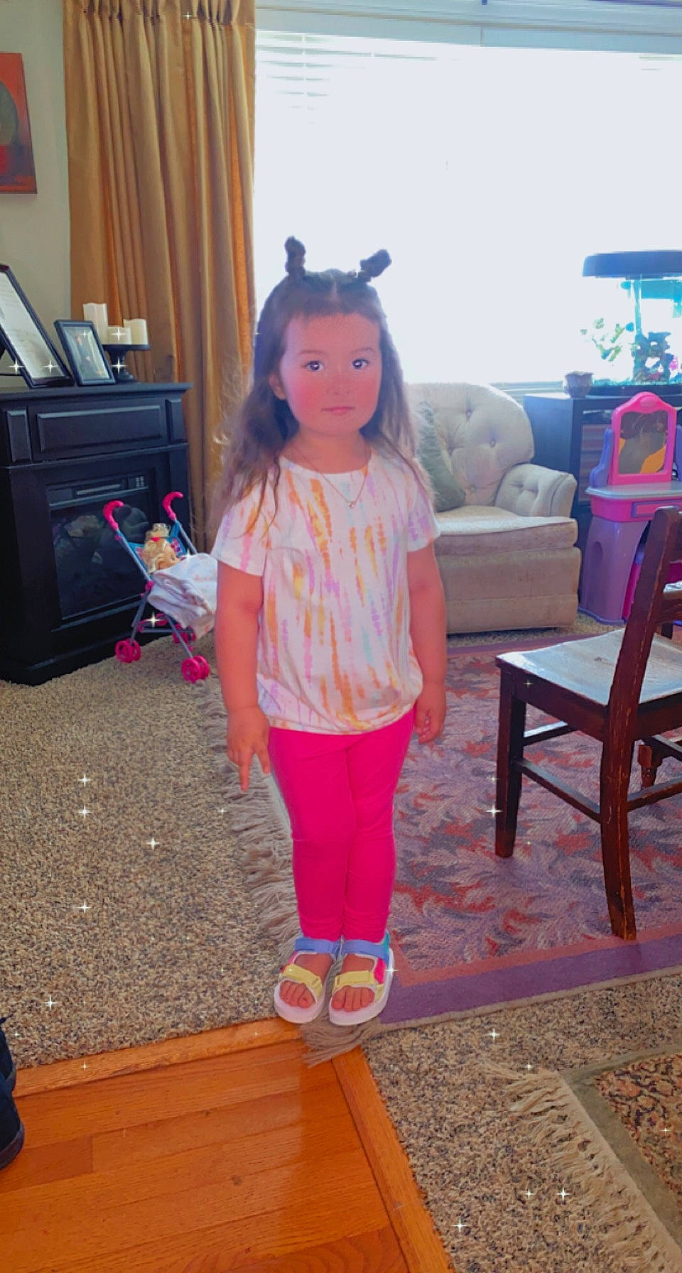 Emmalyn is registered to the contest to win money with this photo: drawer, eyewear, fashion_design, floor, flooring, fun, hardwood, human_leg, joint, leisure, magenta, pattern, peach, person, pink, purple, room, thigh, toy, waist