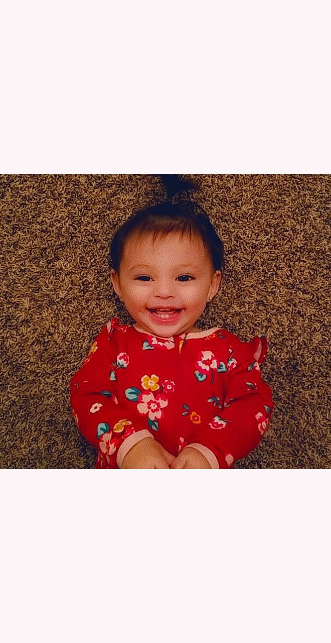 Valencia joined the competition — help win amazing prizes! baby, cheek, child, head, joy, pattern, person, photography, play, red, sitting, skin, smile, snapshot, toddler