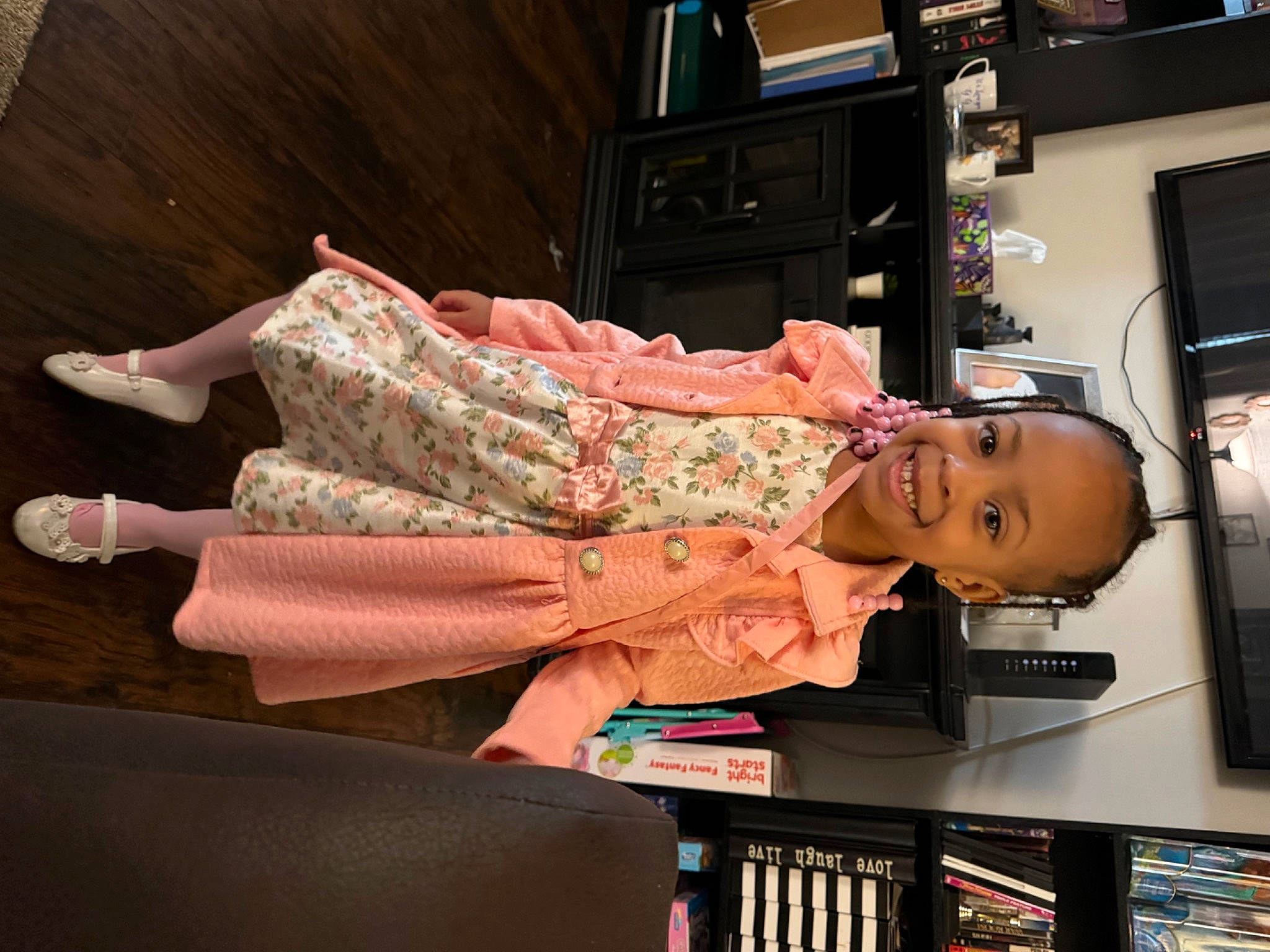 Kambri is registered to the contest to win money with this photo: baby, bookcase, cabinetry, child, drawer, event, fashion_design, flesh, fun, home_appliance, human_leg, joy, machine, nightwear, person, room, shelf, shelving, sitting, television