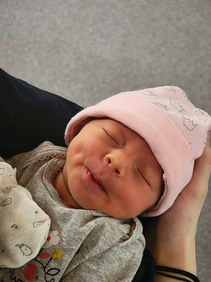 Paisley is registered to the contest to win money with this photo: baby, baby_toddler_clothing, cheek, child, comfort, eye, eyebrow, eyelash, forehead, grass, happy, headwear, linens, lip, mammal, mouth, nose, person, skin, sleeve