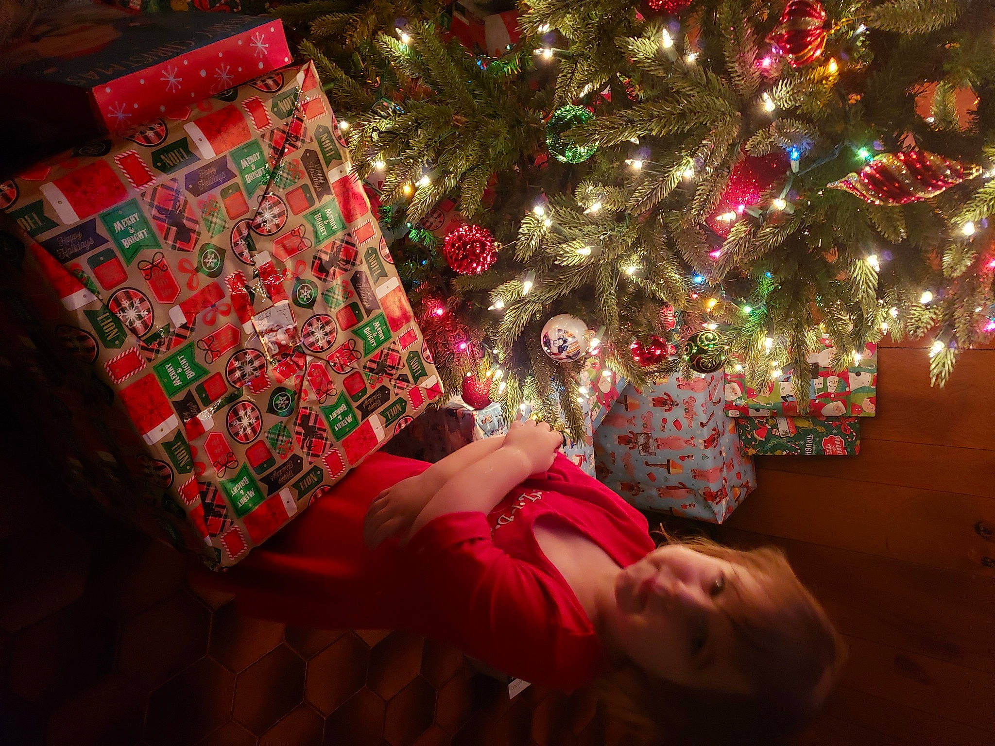 Eleanor joined the competition — help win amazing prizes! christmas, christmas_decoration, christmas_eve, christmas_lights, christmas_ornament, christmas_tree, conifer, event, festival, fir, gift_wrapping, holiday, holiday_ornament, human, interior_design, ornament, person, pine_family, present, red