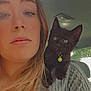 Tony Stuart joined the competition — help win amazing prizes! bell, black_cat, car, casual, cat, close_up, curious, daylight, face, hair, indoor, kitten, pet, portrait, seat, selfie, shoulder, sweater, window, woman