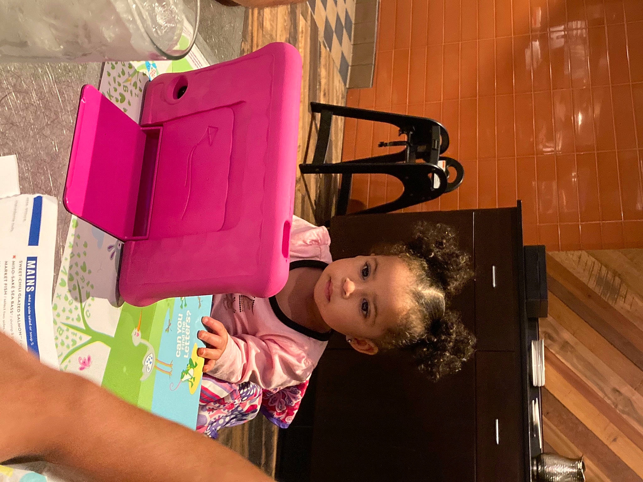 Aaliyah is registered to the contest to win money with this photo: bag, child, eyewear, fun, illustration, leisure, magenta, paper_product, pattern, person, room, t_shirt, tints_and_shades, travel, visual_arts, wood