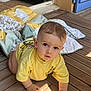 baby, blanket, child, crawling, curious, cute, door, expression, eyes, face, flooring, hands, home, indoor, natural_light, portrait, skin, wooden_floor, yellow_shirt, young_child