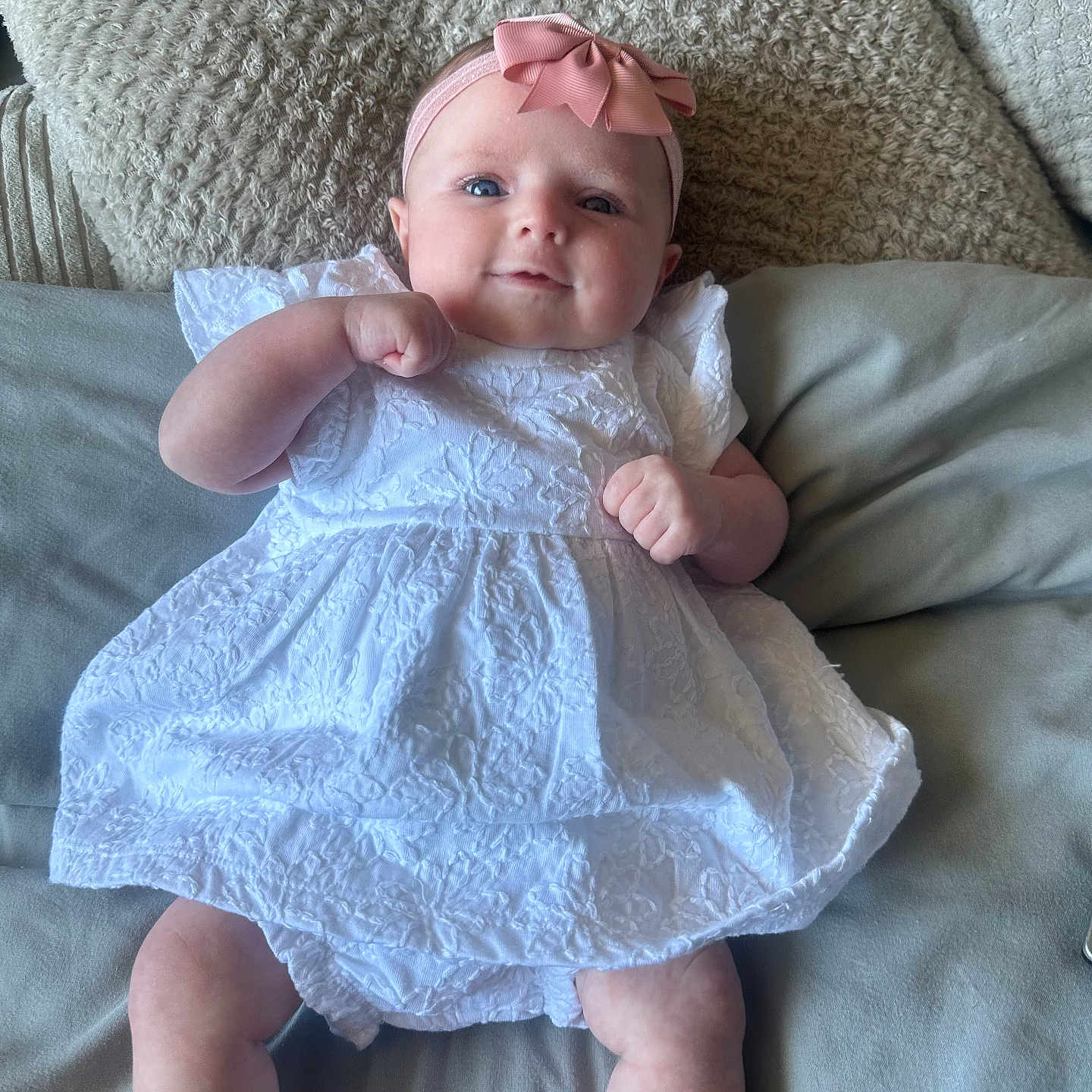 Navy Marie joined the competition — help win amazing prizes! baby, bodypart, clothing, costume, couch, cushion, dress, face, finger, furniture, hand, hat, head, homedecor, linen, newborn, person, photography, portrait, sitting