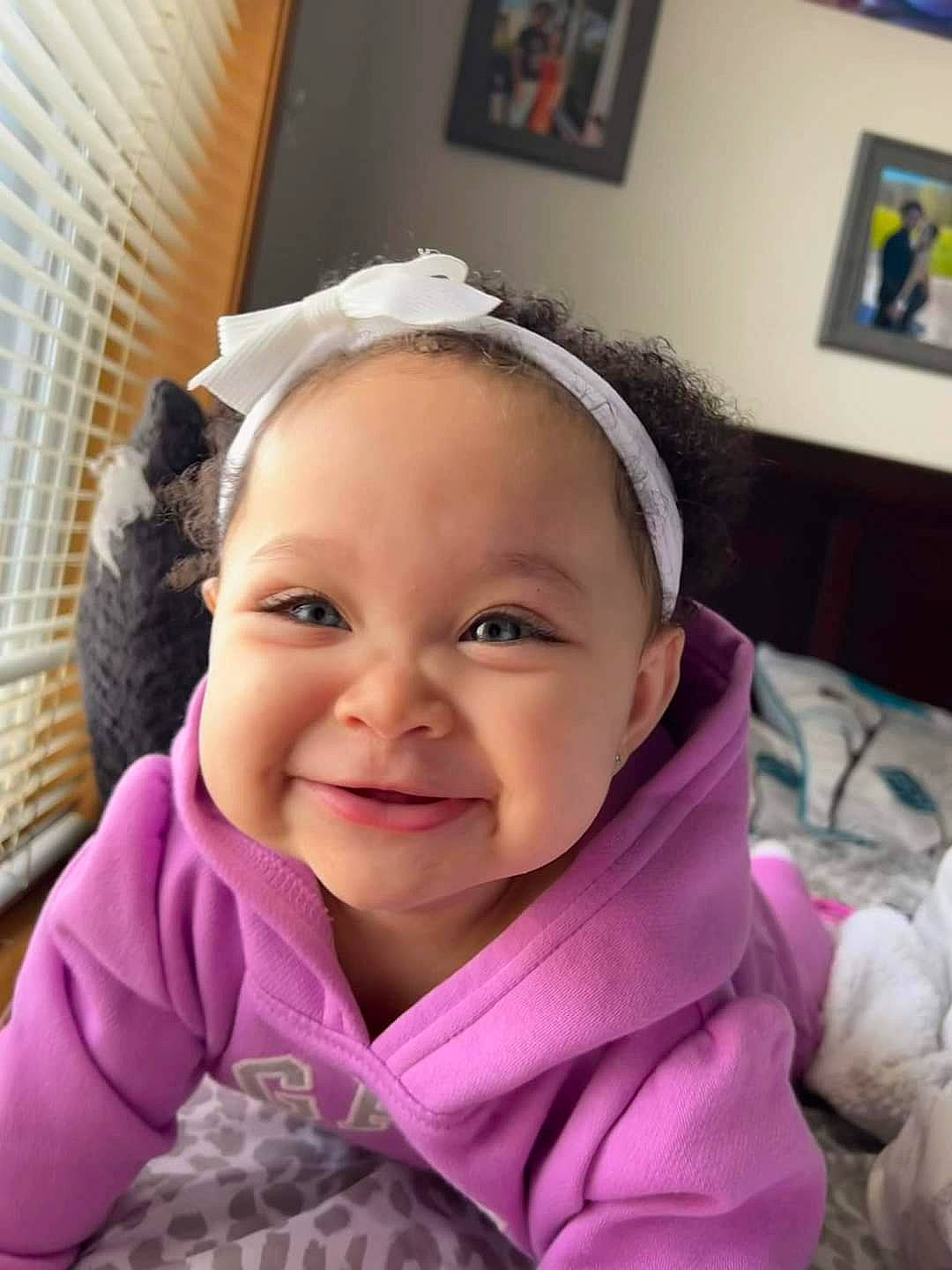 Alani joined the competition — help win amazing prizes! baby, baby_laughing, baby_toddler_clothing, cheek, child, comfort, ear, eyelash, happy, headgear, joy, lip, magenta, nose, person, picture_frame, pink, purple, selfie, smile