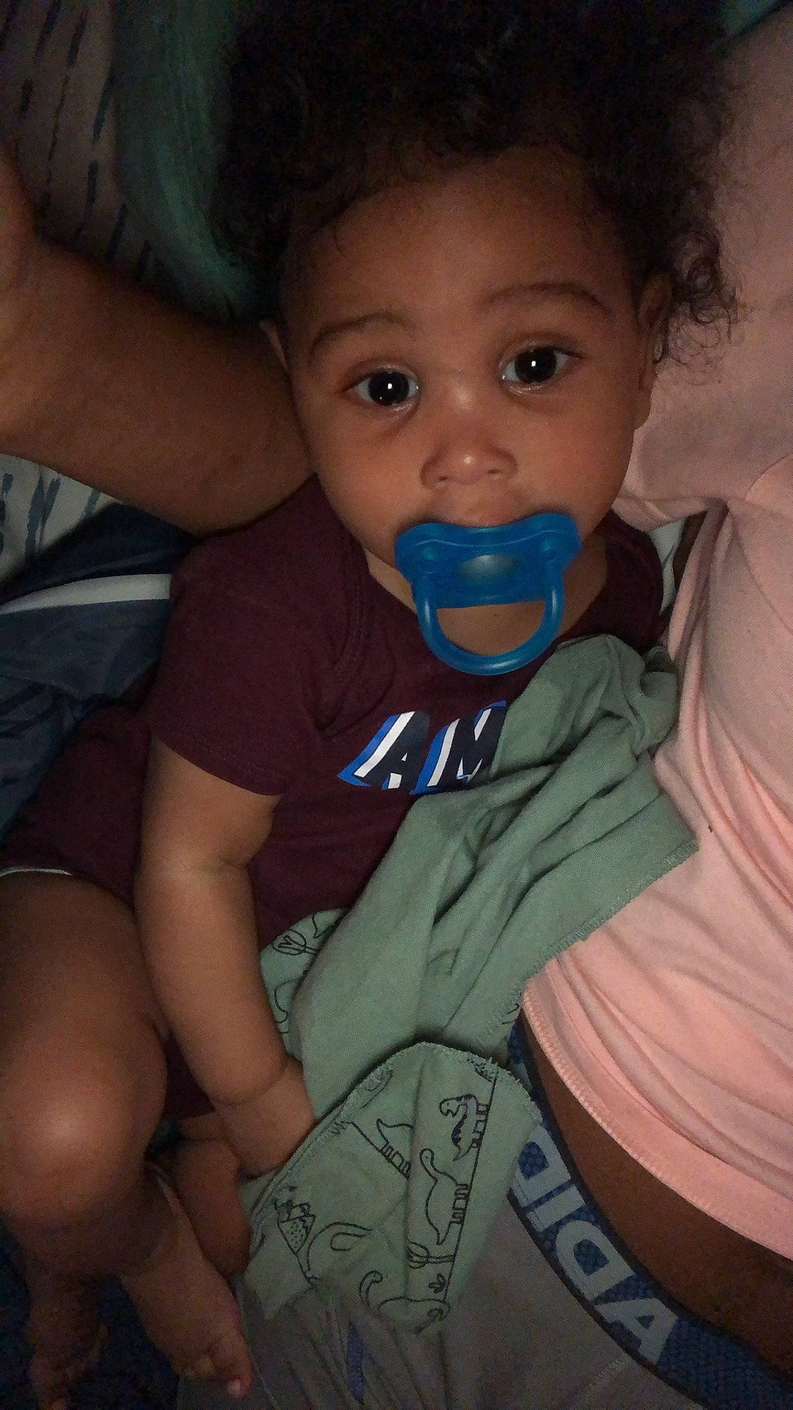 Sincere is registered to the contest to win money with this photo: baby, black_hair, cheek, child, eye, face, fun, head, iris, lip, mouth, neck, nose, person, skin, smile, toddler