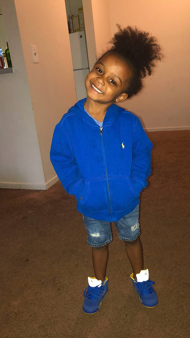 Tarrence is registered to the contest to win money with this photo: blue, child, joy, knee, person, shoe, standing