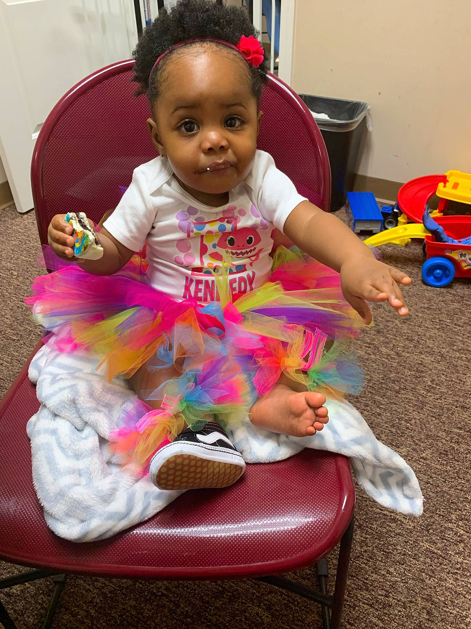 Kennedy joined the competition — help win amazing prizes! baby, baby_playing_with_toys, baby_products, baby_toddler_clothing, baby_toys, child, event, face, fun, hairstyle, happy, head, magenta, person, pink, play, sitting, skin, smile, sock
