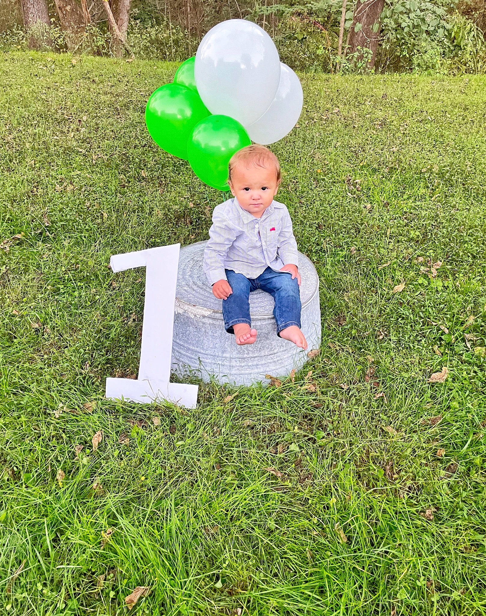 Sander joined the competition — help win amazing prizes! art, balloon, child, fun, grass, grassland, groundcover, happy, lawn, leisure, party_supply, people_in_nature, person, plant, play, recreation, sculpture, sitting, t_shirt, toddler