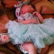 Vivian joined the competition — help win amazing prizes! baby, newborn, infant, tutu, headband, bow, sleeping, blanket, feet, diaper, dress, floral_shoe, hand, ear, cute, cozy, fabric, patterned_bed, portrait, soft_tulle