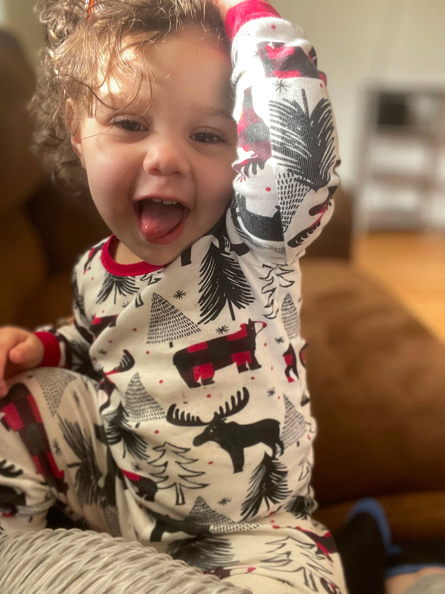 Brayleigh joined the competition — help win amazing prizes! baby, baby_toddler_clothing, cheek, child, comfort, eye, facial_expression, finger, fun, happy, human_body, linens, lip, pattern, person, sitting, skin, sleeve, smile, t_shirt