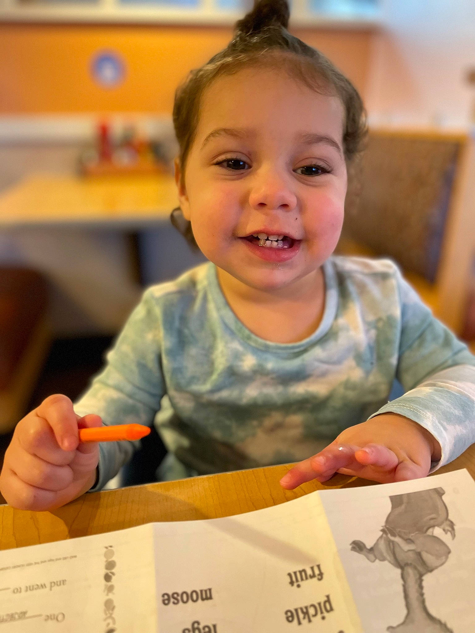 Brayleigh is registered to the contest to win money with this photo: adaptation, chair, child, event, finger, fun, gesture, hairstyle, hand, happy, human, joy, nail, people, person, room, smile, t_shirt, thumb, toddler