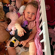 Leyah a rejoint le concours — aidez-le/la à gagner de superbes lots ! baby, bee, blanket, blue_eyes, child, cozy, crib, crib_bars, cuddling, doll, infant, minnie_mouse, nursery, pink, plush_toy, portrait, smile, stuffed_animal, toys, unicorn