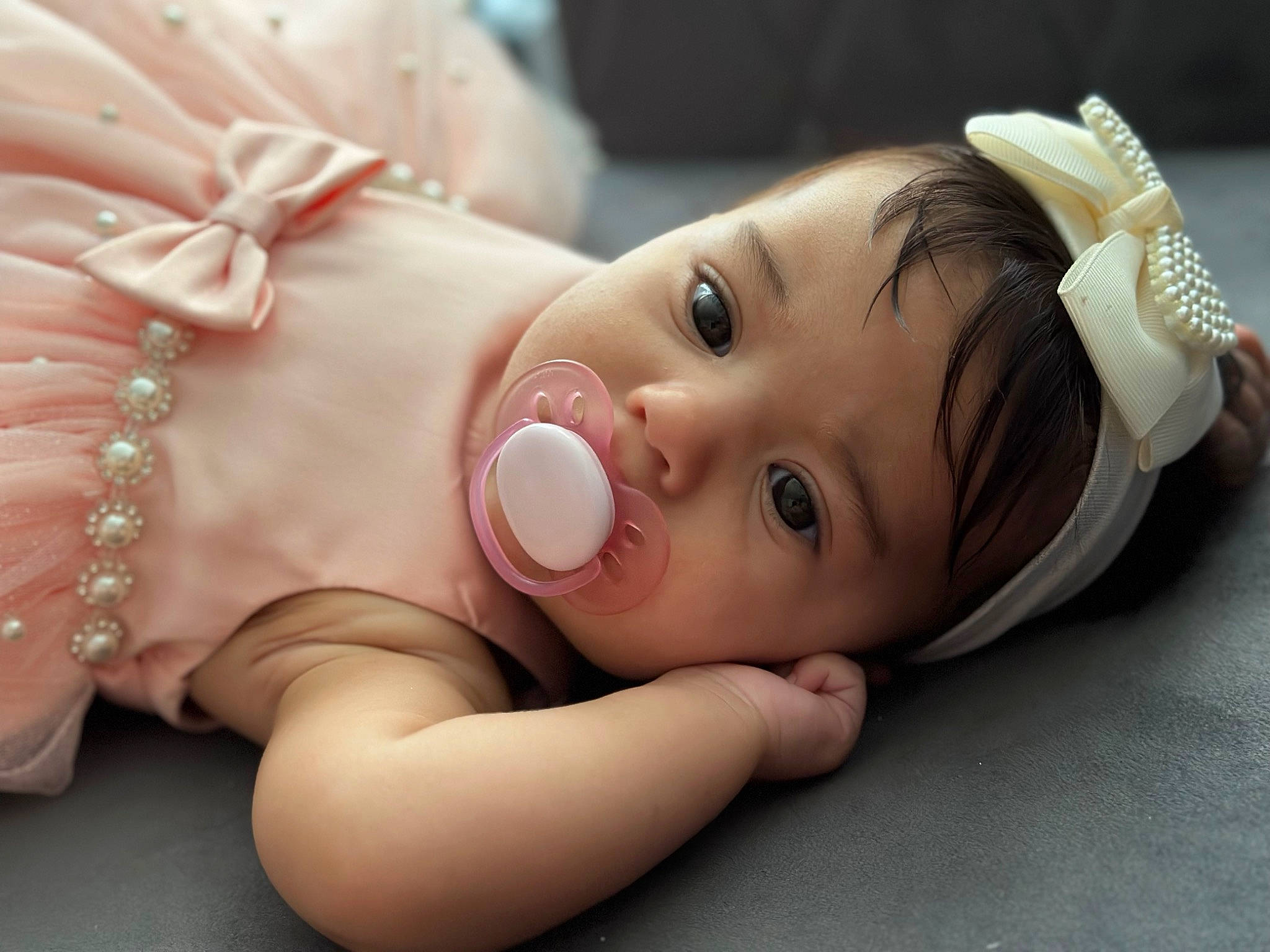 Allana joined the competition — help win amazing prizes! baby, baby_toddler_clothing, cheek, ear, eyebrow, eyelash, finger, flash_photography, gesture, grass, happy, headgear, headpiece, headwear, iris, lip, mouth, nose, person, pink