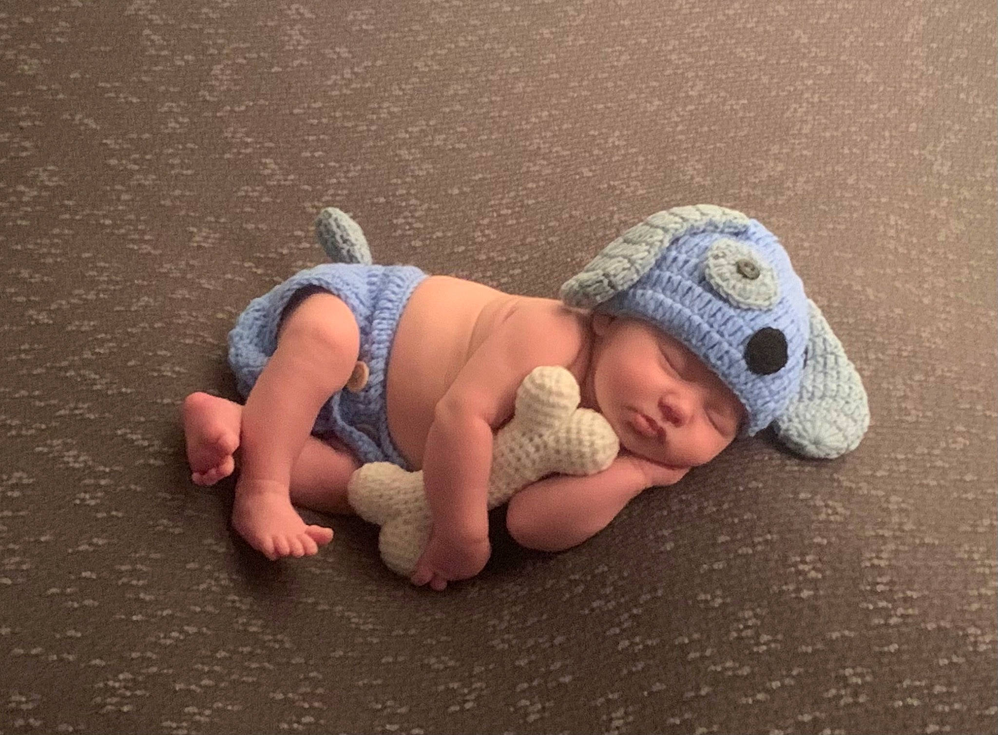 Miles joined the competition — help win amazing prizes! baby, baby_products, baby_toddler_clothing, barefoot, cap, child, comfort, crawling, flooring, foot, fun, grass, headwear, human_body, human_leg, linens, person, play, sand, sitting