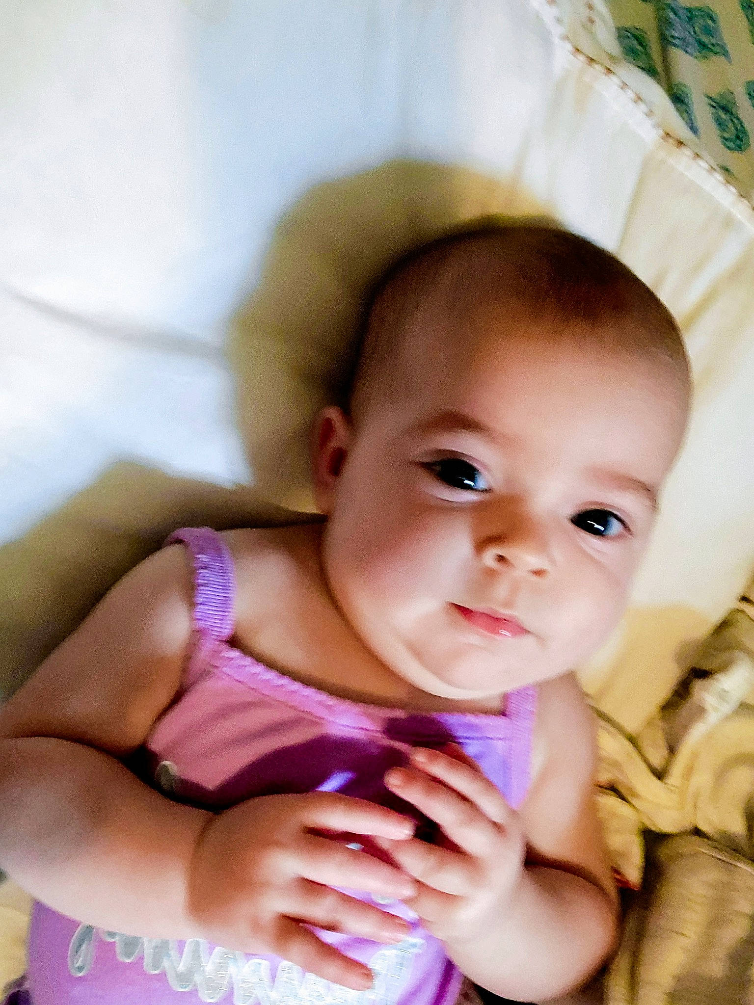 Kaylannah is registered to the contest to win money with this photo: baby, baby_toddler_clothing, cheek, chin, eyebrow, eyelash, finger, gesture, hand, happy, iris, lip, mouth, neck, nose, person, pink, skin, smile, textile