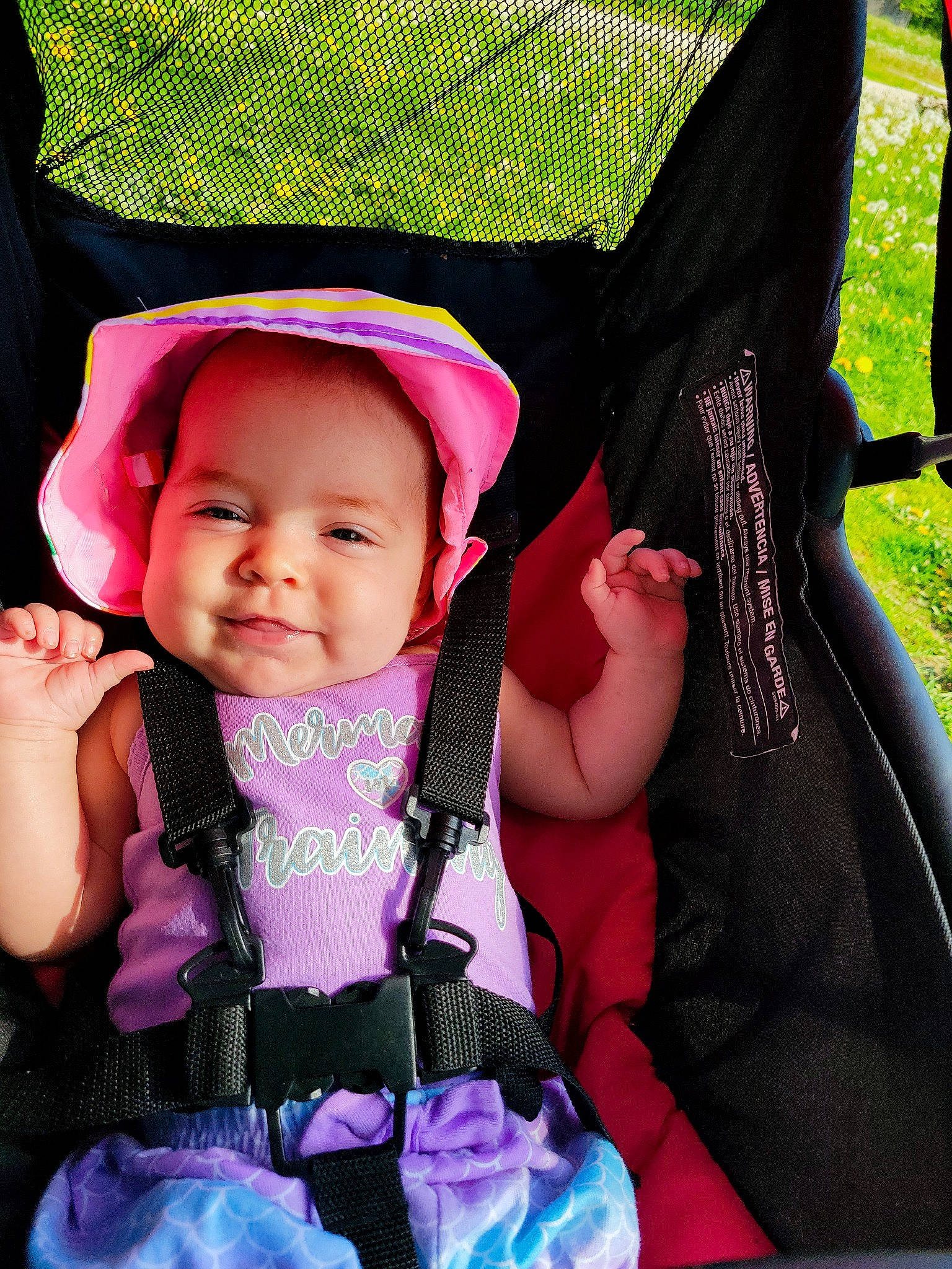 Kaylannah joined the competition — help win amazing prizes! baby, baby_carriage, baby_toddler_clothing, black, cheek, comfort, cool, eye, facial_expression, green, happy, magenta, person, photograph, pink, product, purple, skin, smile, toddler