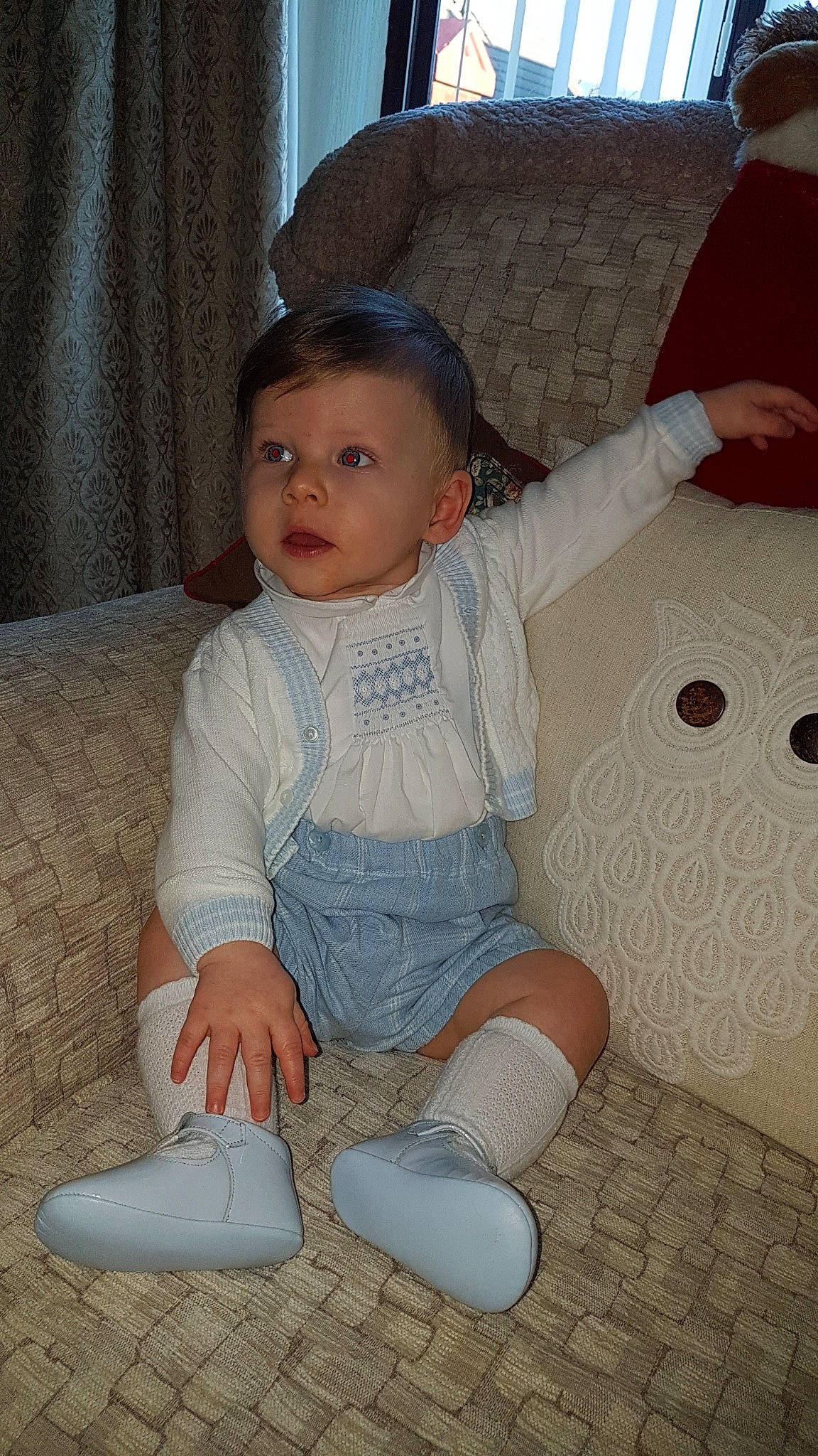 Bowie is registered to the contest to win money with this photo: boy, child, cool, day, eye, fun, girl, infant, leg, person, product, sitting, skin, smile, standing, textile, toddler, white