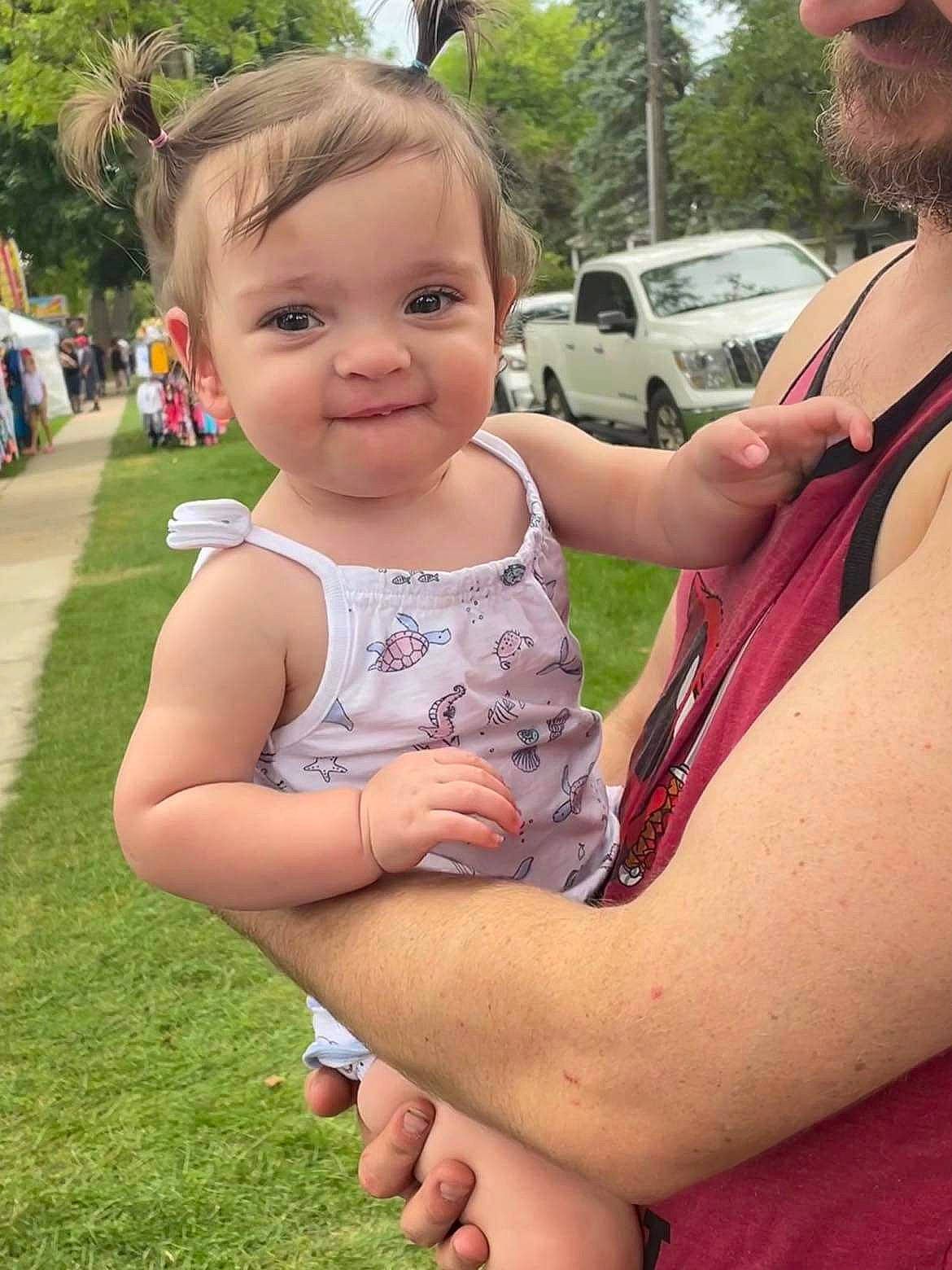 Madison joined the competition — help win amazing prizes! baby, car, finger, fun, gesture, grass, happy, head, joy, leisure, people_in_nature, person, pink, plant, recreation, skin, smile, summer, tire, toddler