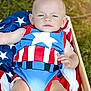 Levi joined the competition — help win amazing prizes! baby, infant, child, portrait, outdoor, flag, american_flag, costume, clothing, crate, grass, person, cute, red, blue, white, star, pattern, relaxing, summer
