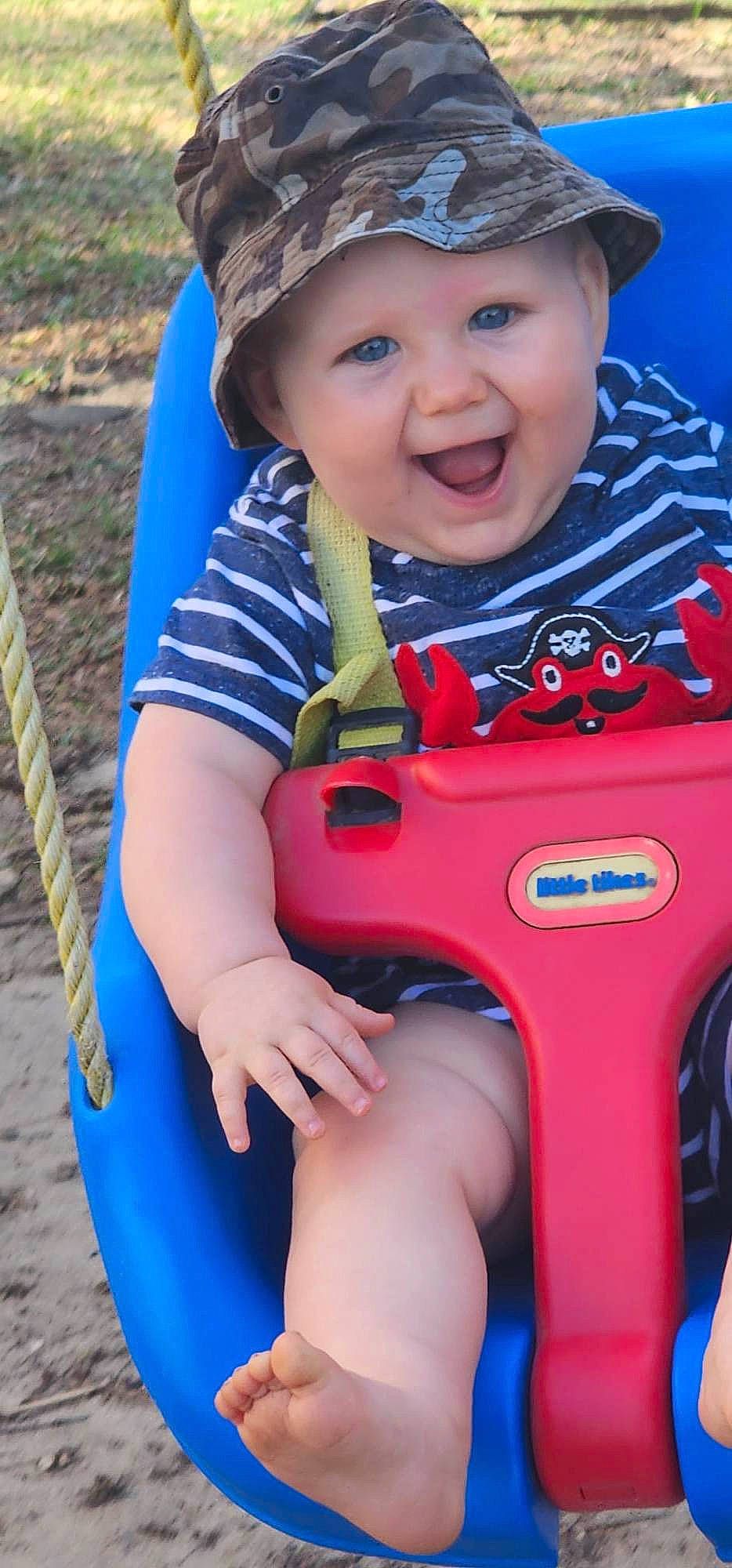 Elijah is registered to the contest to win money with this photo: azure, baby, baby_toddler_clothing, blue, child, clothing, cool, electric_blue, face, fun, happy, headwear, leisure, organ, people, person, pink, recreation, skin, smile