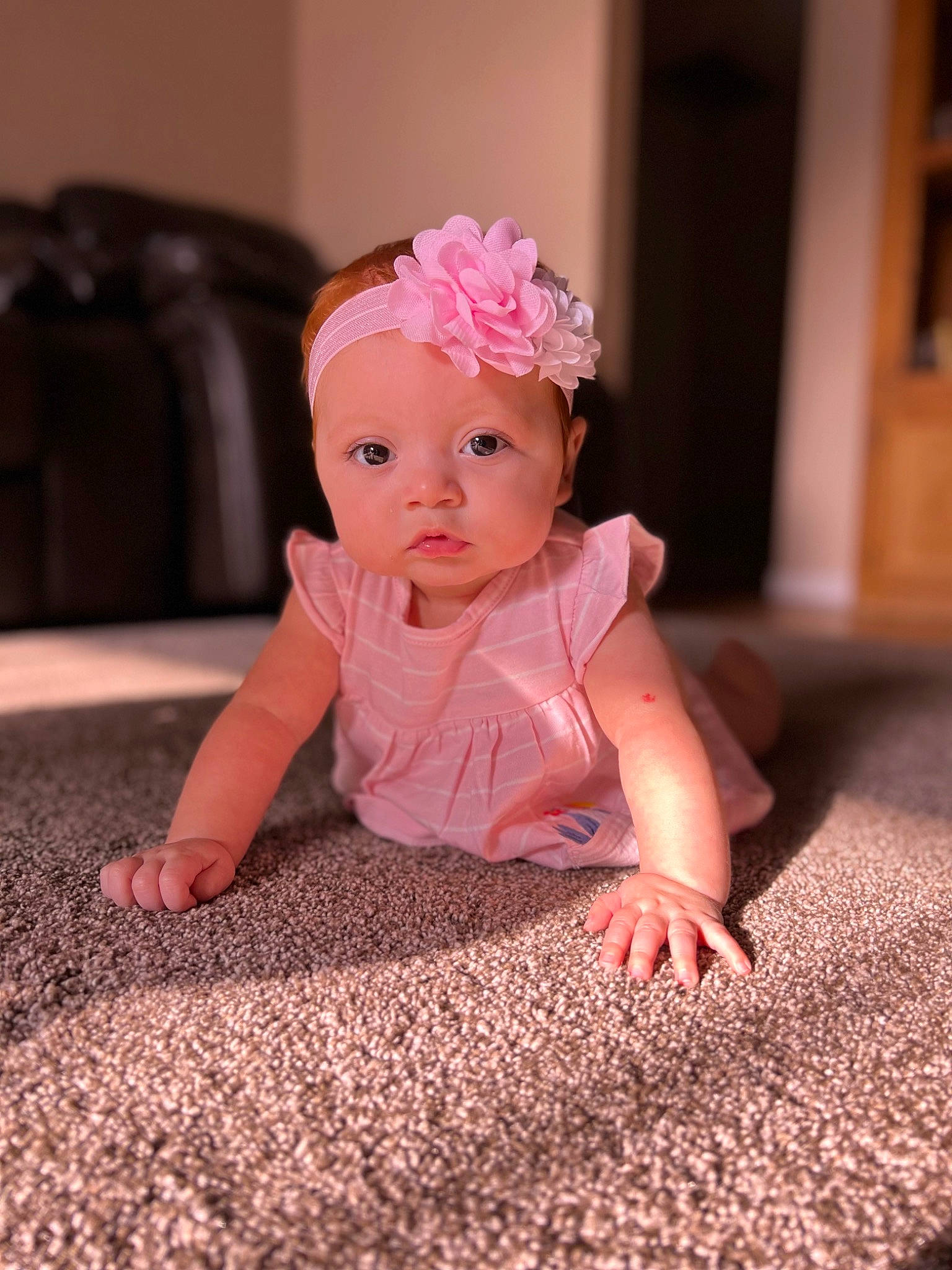 Alanii is registered to the contest to win money with this photo: baby, baby_toddler_clothing, cheek, clothing, dress, eye, floor, flooring, happy, head, headpiece, headwear, iris, leg, lip, magenta, person, petal, pink, sleeve