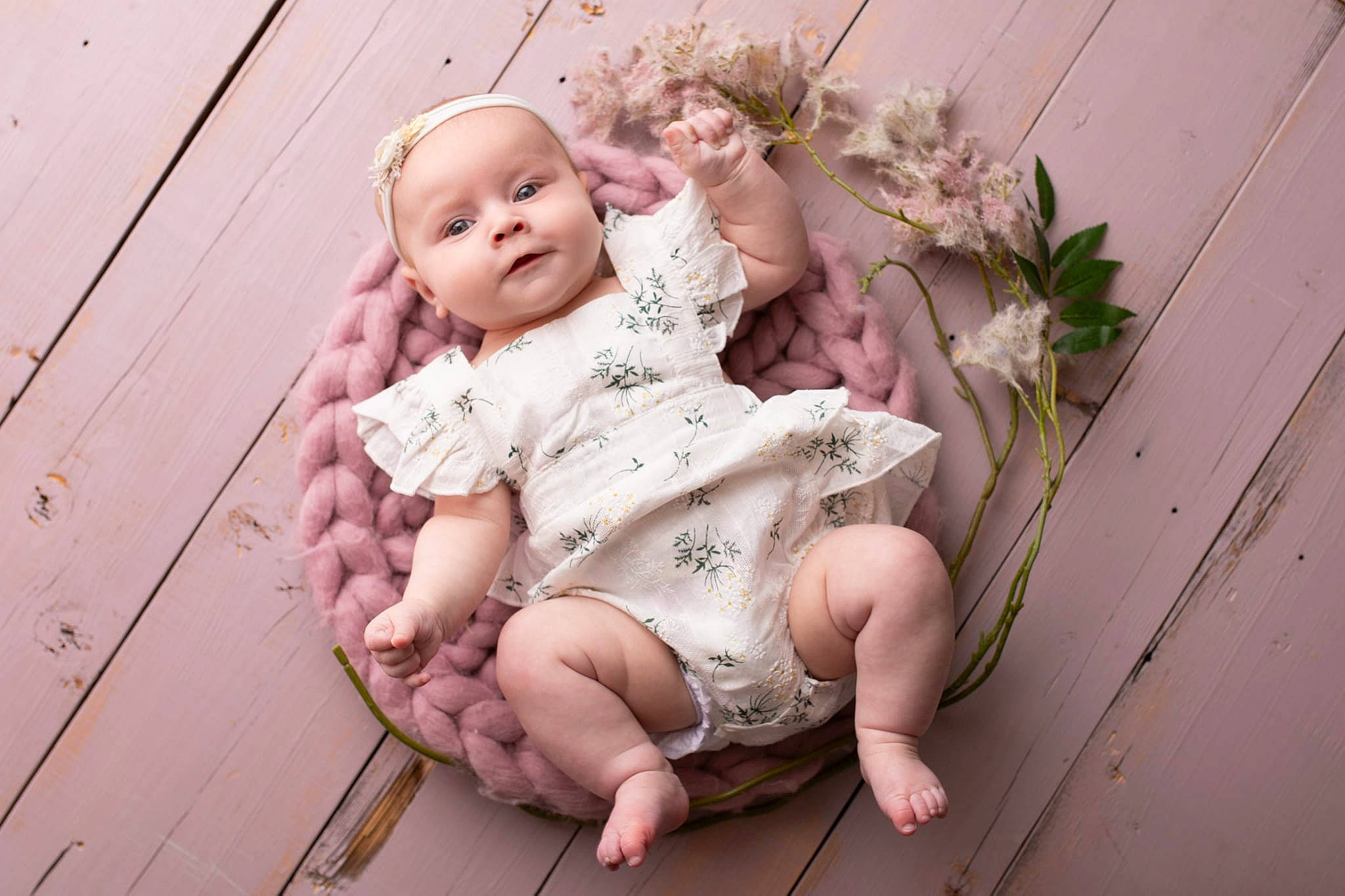 Mallory is registered to the contest to win money with this photo: baby, baby_toddler_clothing, barefoot, comfort, flash_photography, floor, flooring, foot, grass, happy, human_body, human_leg, knee, person, pink, plant, skin, smile, thigh, toddler