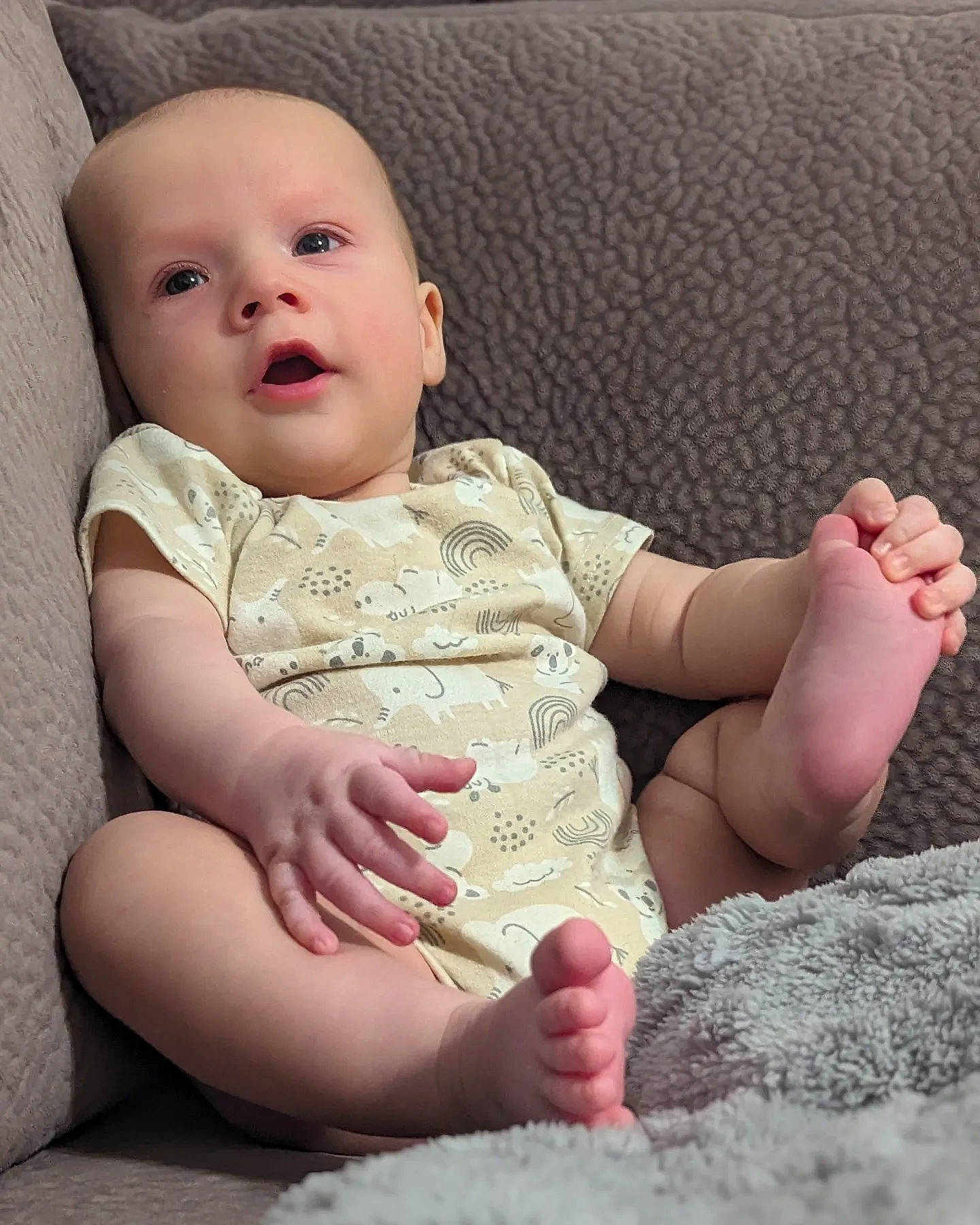 David is registered to the contest to win money with this photo: arm, baby, baby_toddler_clothing, cheek, chin, comfort, finger, flash_photography, gesture, human_body, lip, mouth, nail, nose, person, pink, skin, sleeve, standing, thumb