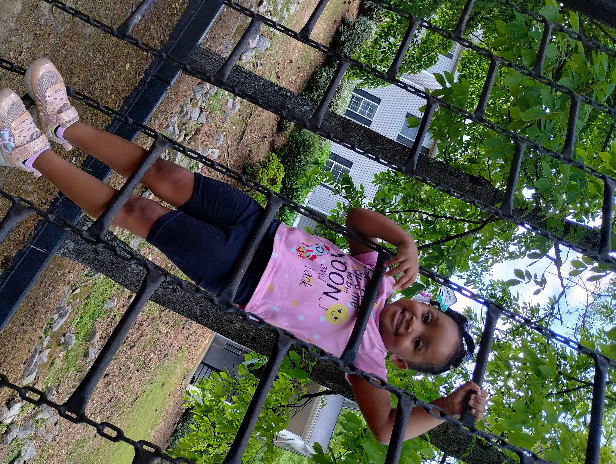 Sommer Riley is registered to the contest to win money with this photo: city, facade, fun, grass, joy, leisure, magenta, metal, people_in_nature, person, plant, summer, t_shirt, thigh, tree, urban_design