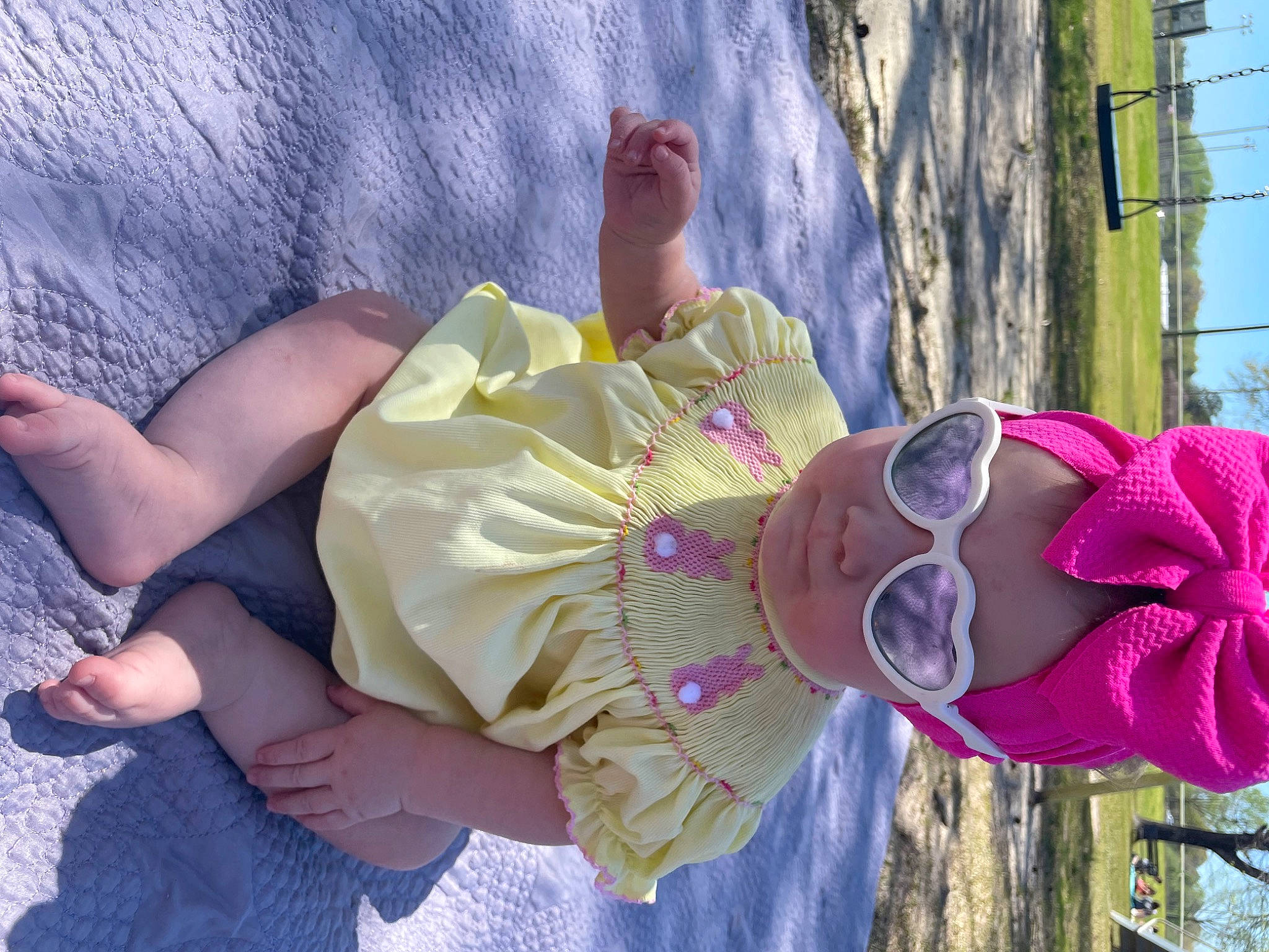 Emmylou joined the competition — help win amazing prizes! baby, child, costume, eyewear, fun, goggles, hat, human_leg, leisure, magenta, person, pink, plant, sky, smile, sun_hat, sunglasses, textile, toddler, tree