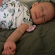 Alexander joined the competition — help win amazing prizes! baby, sleeping, blanket, pacifier, plush_toy, bed, child, peaceful, indoor, soft, cute, infant, resting, comfort, green, pattern, hand, face, young, relax