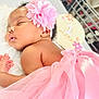baby, infant, sleeping, pink, flower_headband, tutu, soft, white_surface, milestone_sign, 1_month, cute, peaceful, portrait, child, newborn, closeup, adorable, resting, skin, hand