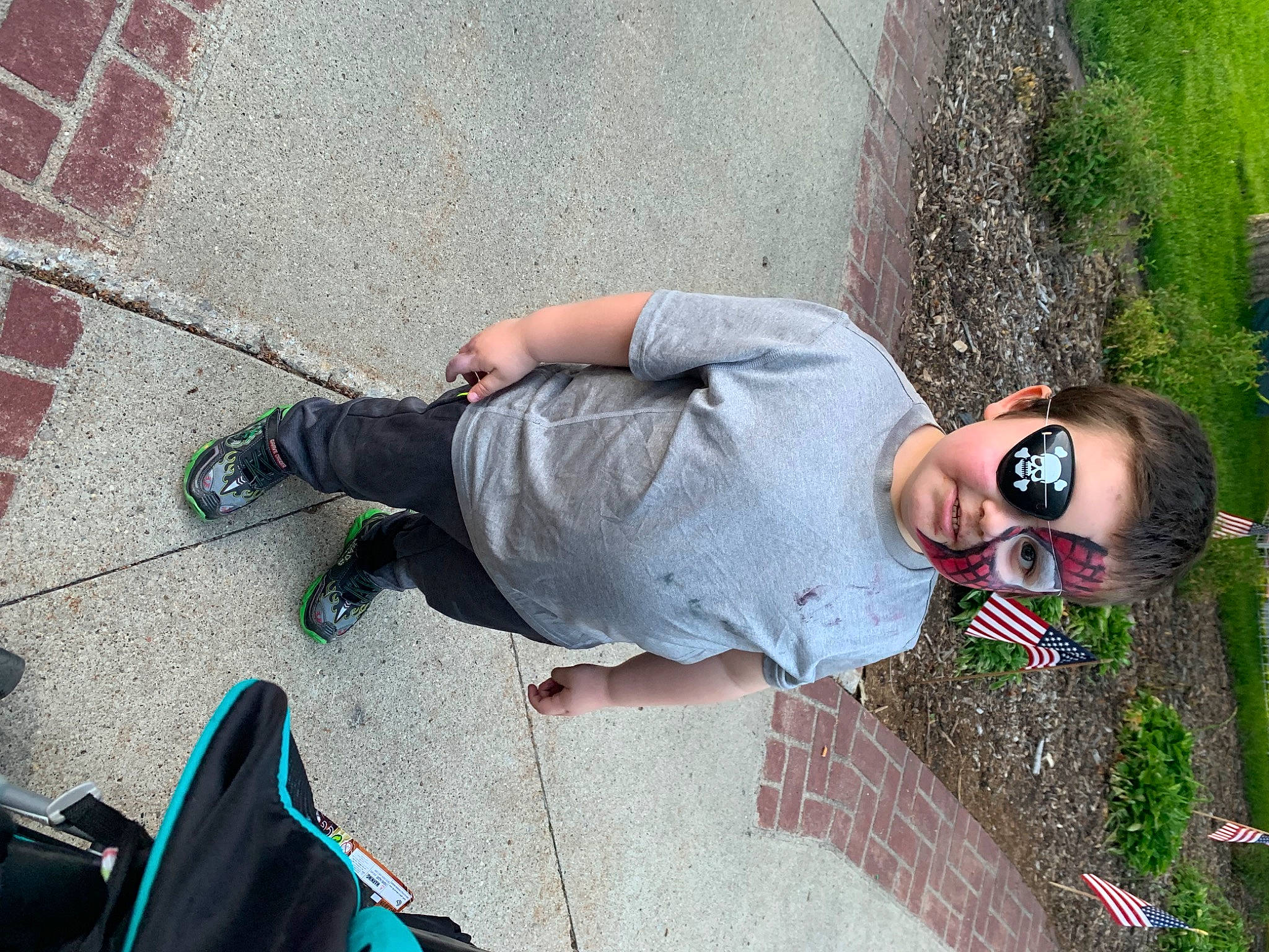 Mark Jr joined the competition — help win amazing prizes! asphalt, black, eyewear, fun, glasses, goggles, grass, joint, leaf, leg, leisure, mammal, people, person, photograph, plant, road_surface, sidewalk, sunglasses, vertebrate
