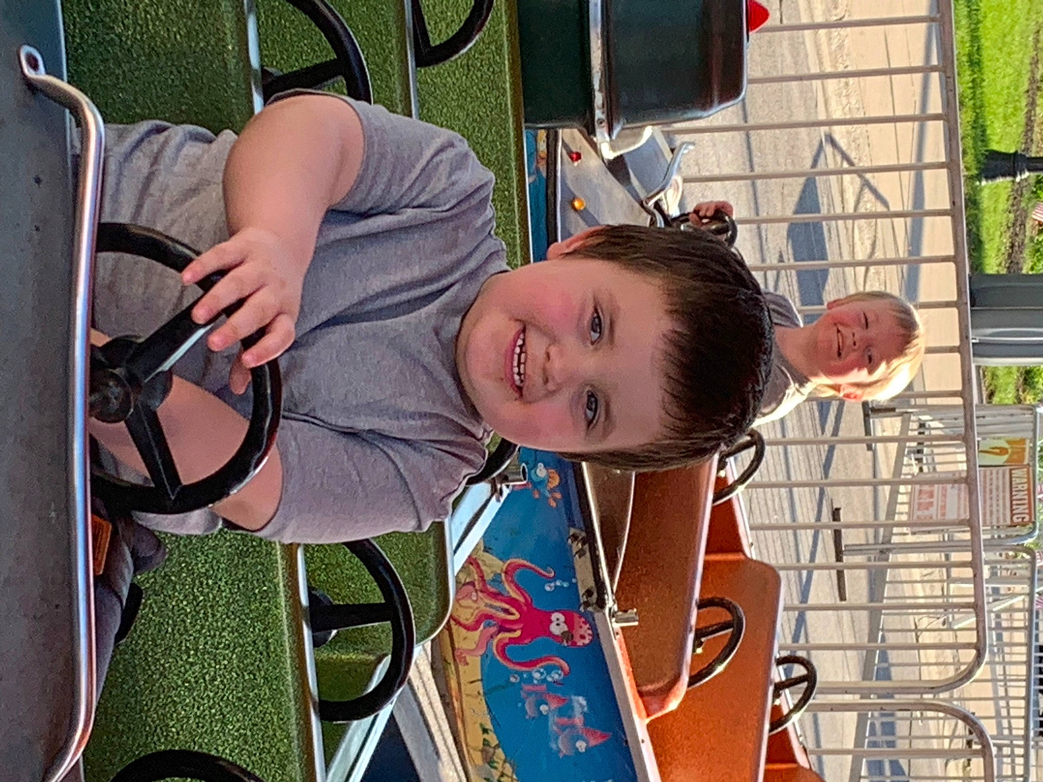 Mark Jr joined the competition — help win amazing prizes! audio_equipment, auto_part, baby_products, bicycle_tire, chair, child, cool, family_car, fun, hairstyle, happy, joy, leisure, motor_vehicle, pattern, person, recreation, steering_wheel, tire, toddler