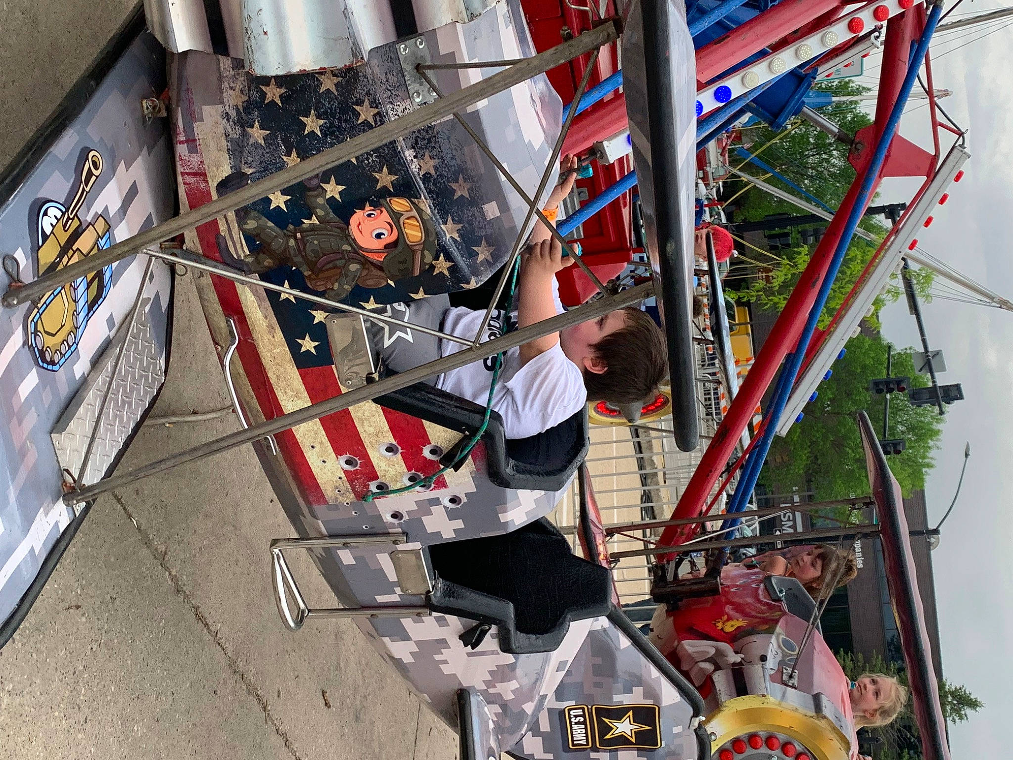 Mark Jr is registered to the contest to win money with this photo: amusement_park, amusement_ride, auto_part, automotive_wheel_system, city, engineering, event, ferris_wheel, fun, leisure, machine, metal, nonbuilding_structure, person, pole, recreation, rim, sky, spoke, tire