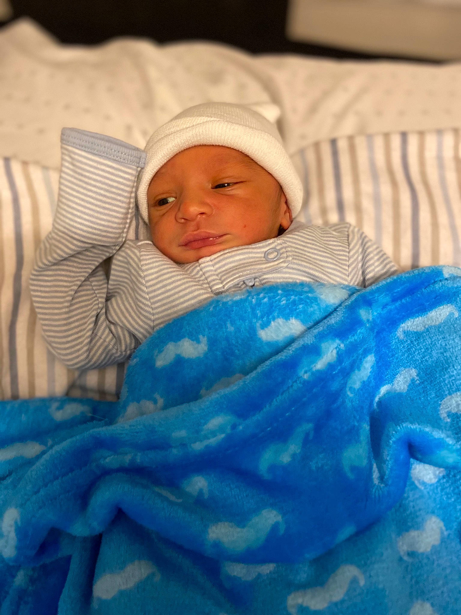 Kyngston is registered to the contest to win money with this photo: baby, baby_products, baby_sleeping, baby_toddler_clothing, bedding, bedtime, blanket, cheek, child, comfort, electric_blue, event, eye, headwear, linens, nap, person, room, skin, sleep