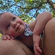Ashley joined the competition — help win amazing prizes! baby, child, face, skin, hand, outdoor, nature, tree, sky, daylight, portrait, closeup, expression, cute, person, resting, knees, summer, soft_light, peaceful