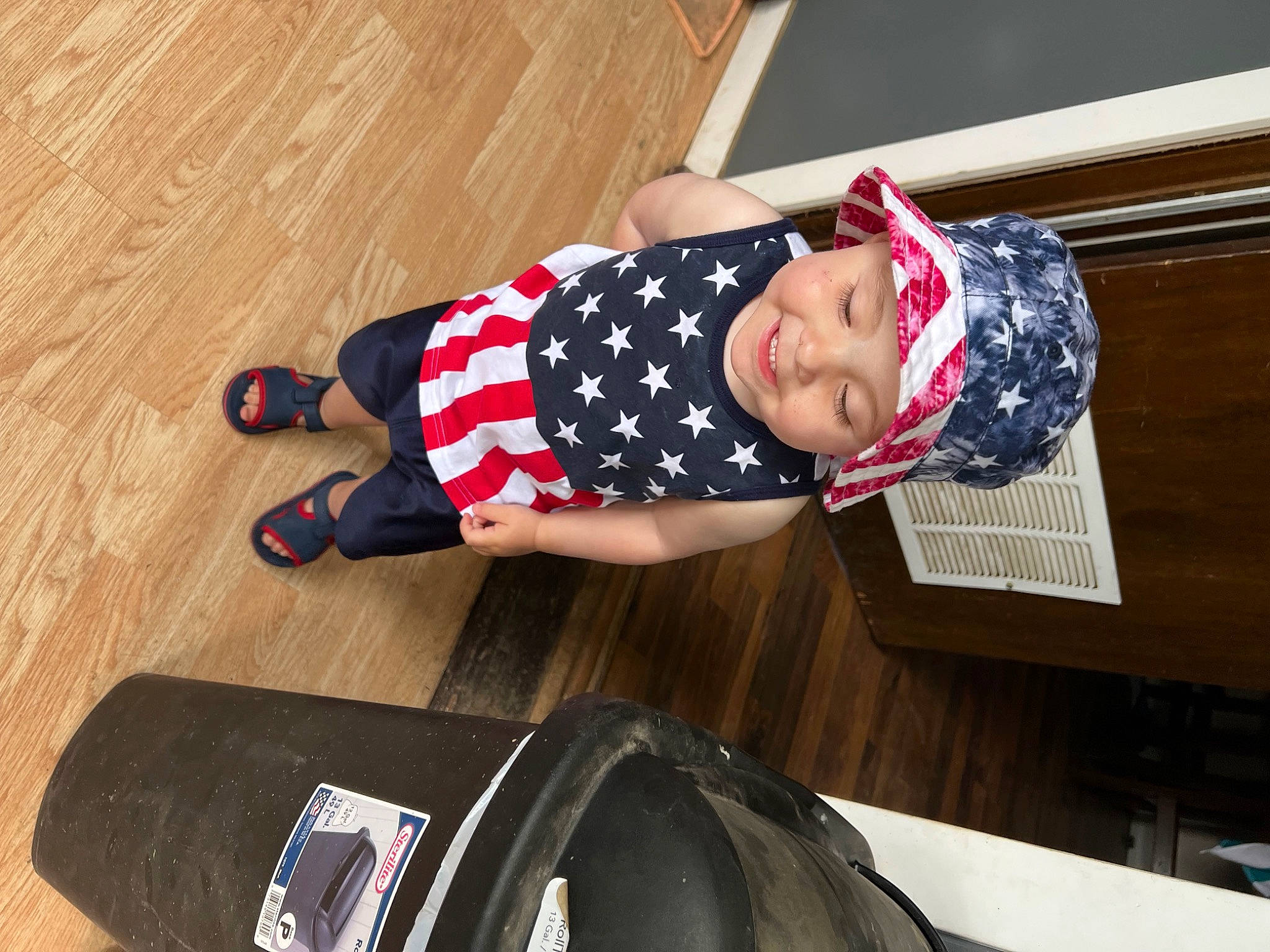 Paxton joined the competition — help win amazing prizes! automotive_tire, baby_toddler_clothing, child, costume, flag_of_the_united_states, flooring, fun, hardwood, hat, headwear, human_leg, joy, knee, pattern, person, sleeve, smile, sportswear, thigh, toddler