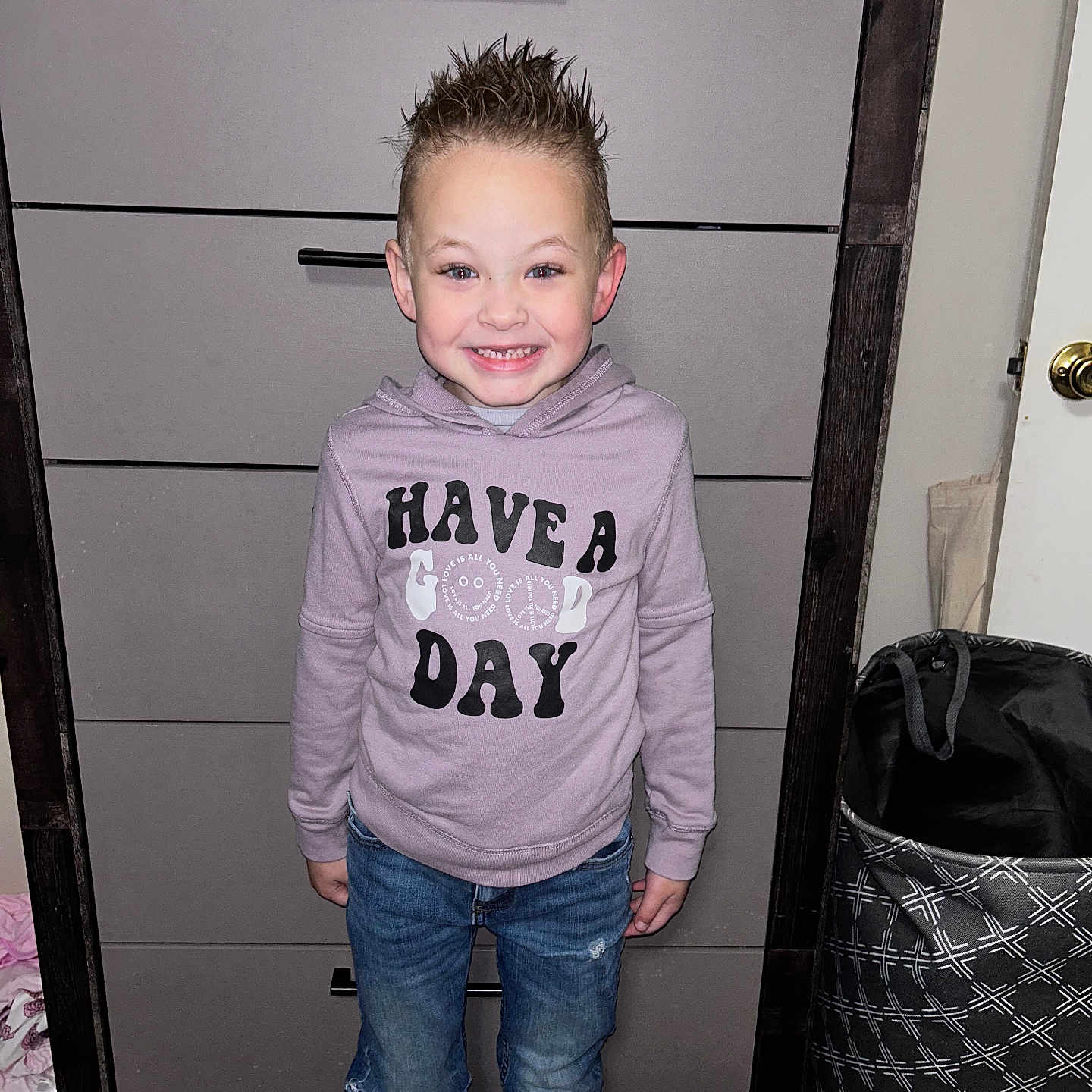 Lennox joined the competition — help win amazing prizes! accessories, bag, boy, cabinet, child, clothing, drawer, face, filingcabinet, furniture, handbag, head, hoodie, jeans, knitwear, male, pants, person, sweater, t_shirt