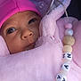 Bayan a rejoint le concours — aidez-le/la à gagner de superbes lots ! baby, infant, pink, hat, pacifier, clothing, bundle, cute, face, closeup, child, soft, warm, cozy, newborn, accessory, smile, expression, indoors, portrait