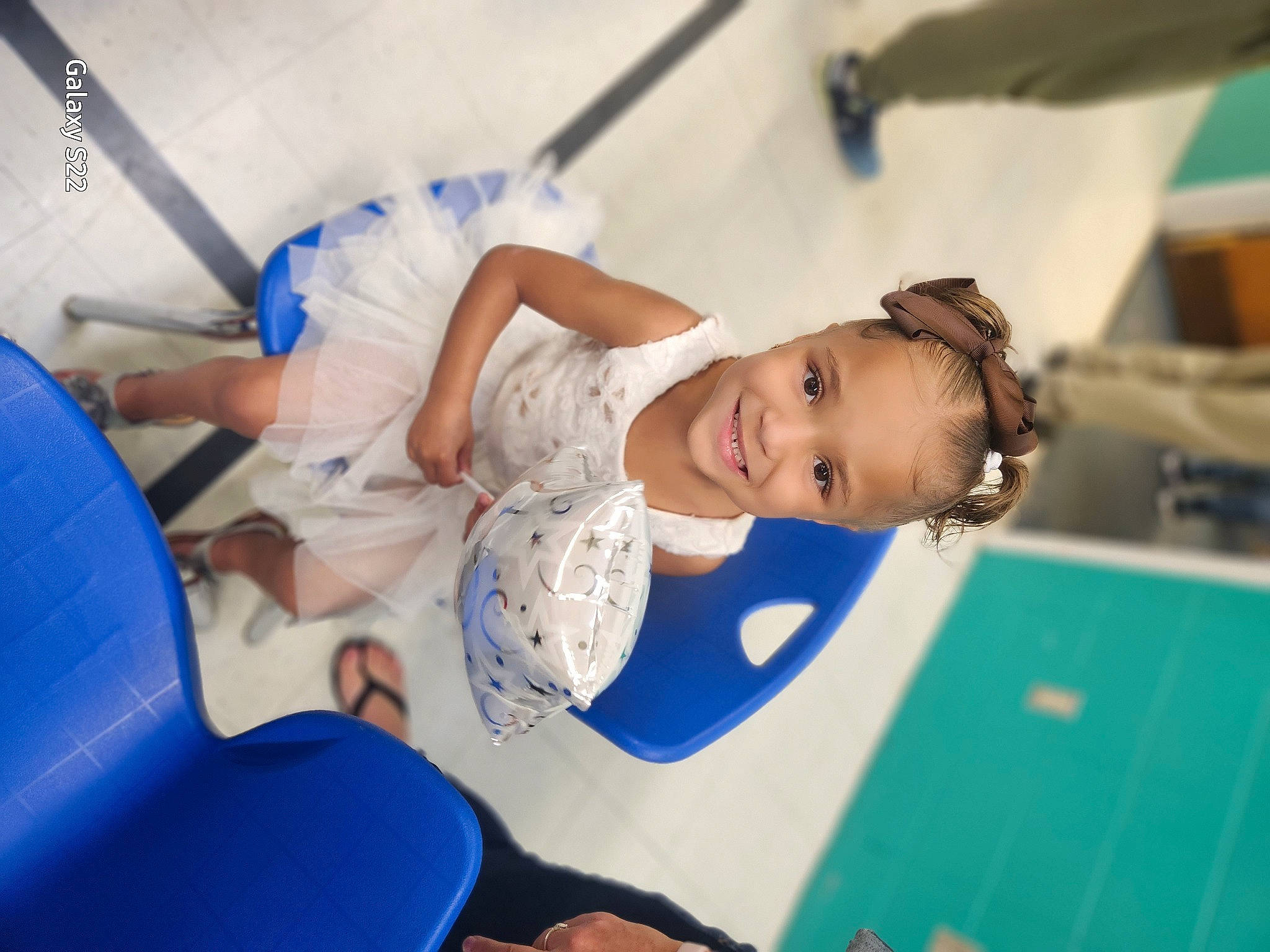 Jaizlynn is registered to the contest to win money with this photo: baby, blue, child, elbow, electric_blue, event, fun, happy, indoor_games_and_sports, joy, knee, leisure, outdoor_play_equipment, person, play, recreation, room, smile, t_shirt, thigh