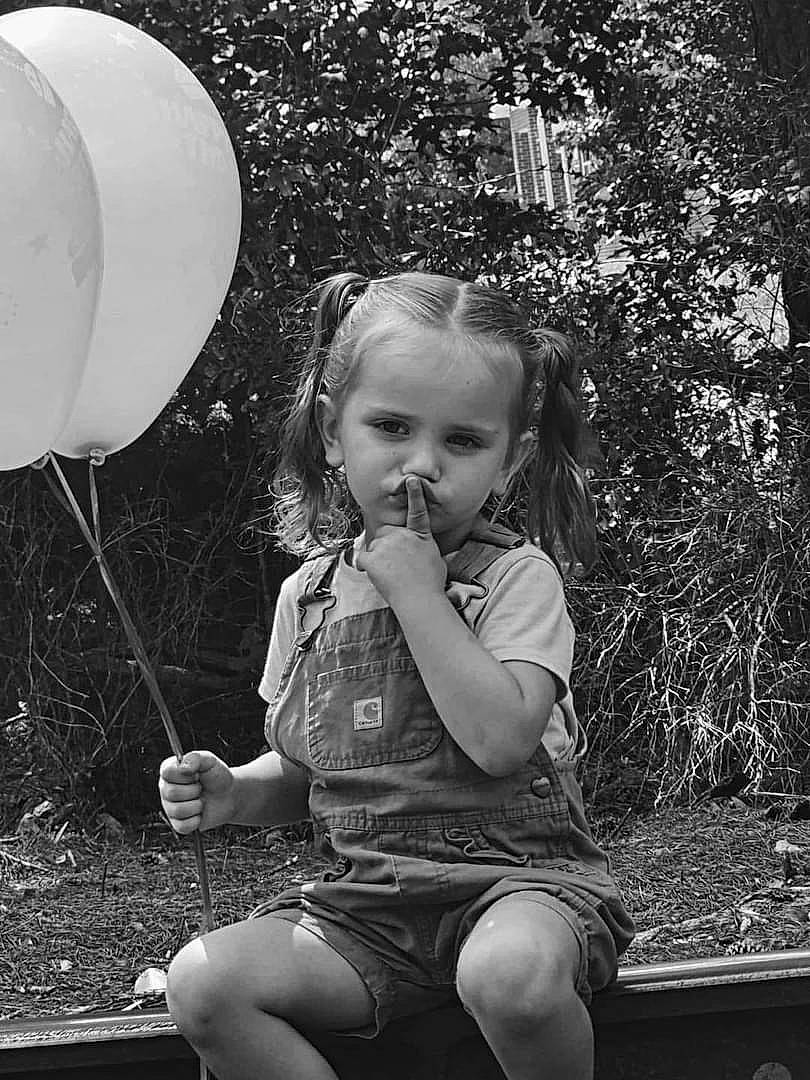 Elizabeth joined the competition — help win amazing prizes! balloon, black, black_and_white, child, eye, facial_expression, flash_photography, fun, grass, hair, hairstyle, happy, human, people_in_nature, person, photograph, plant, standing, style, tree