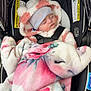 Evelyn joined the competition — help win amazing prizes! baby, infant, sleeping, car_seat, blanket, hood, beanie, hat, striped_canopy, floral_blanket, pink, cozy, seat_belt, shopping_cart, warning_label, closed_eyes, newborn, portrait, cute, soft_fabric