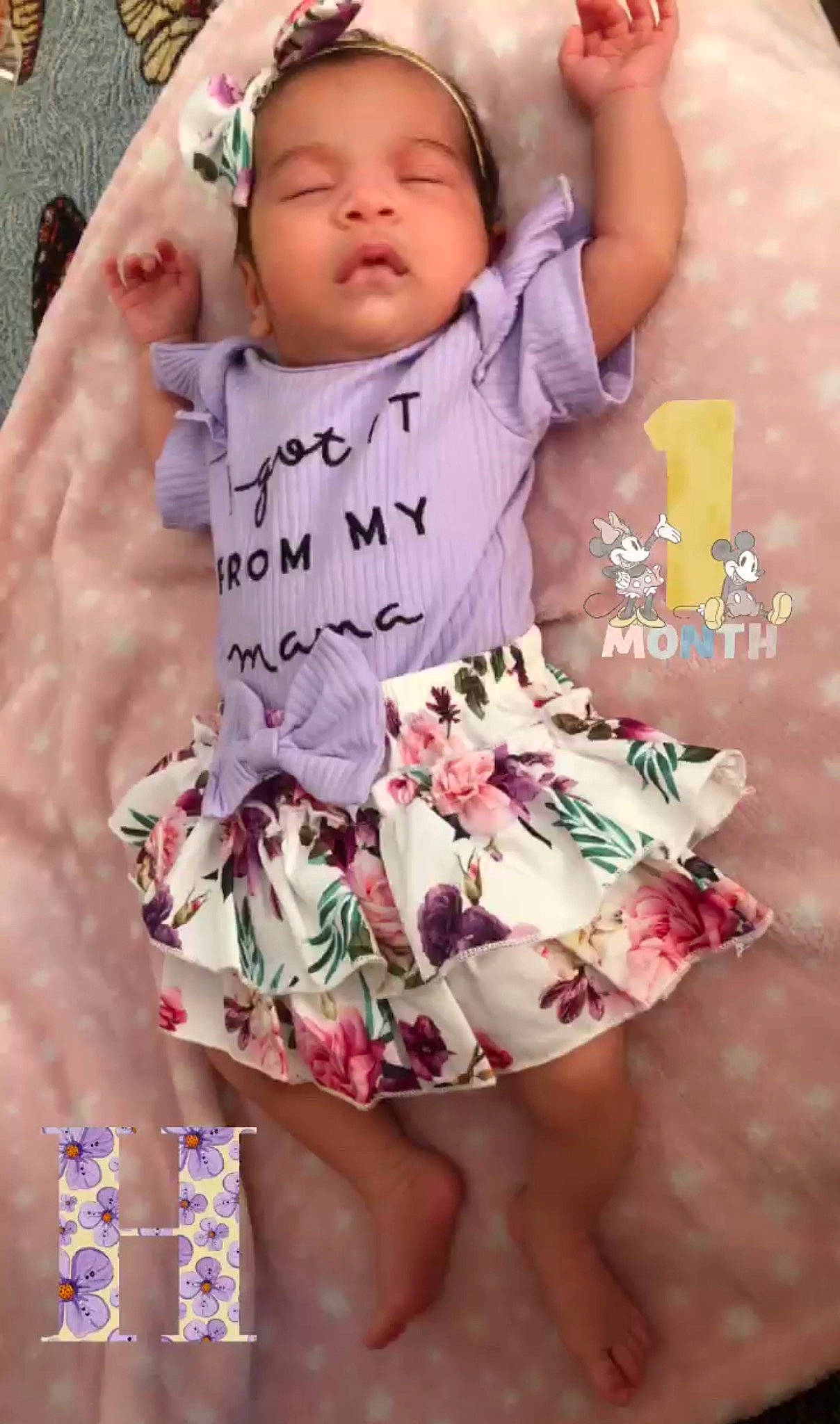 Harmony is registered to the contest to win money with this photo: arm, baby, baby_toddler_clothing, child, cool, finger, gesture, hairstyle, hand, happy, nail, neck, pattern, person, photograph, pink, skin, sleeve, thigh, thumb