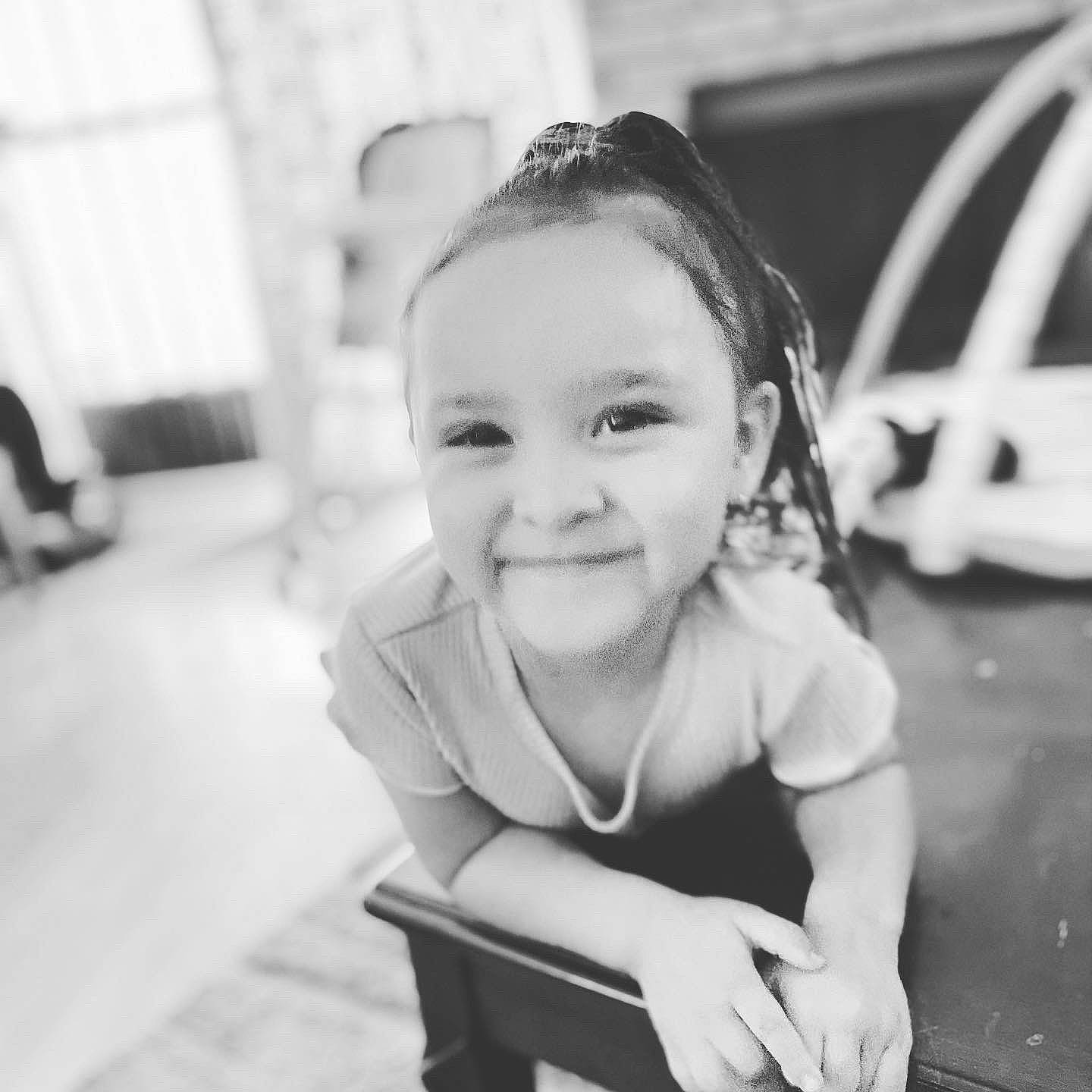 Meilani is registered to the contest to win money with this photo: audio_equipment, baby, black_and_white, child, flash_photography, flooring, fun, happy, iris, joy, laugh, monochrome, monochrome_photography, nose, person, portrait_photography, recreation, sitting, smile, stock_photography