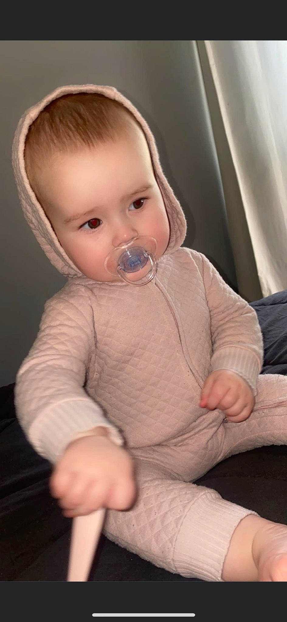Lylah joined the competition — help win amazing prizes! baby, baby_toddler_clothing, cheek, chest, comfort, elbow, eyelash, finger, gesture, human_body, iris, lip, mouth, neck, nose, person, sitting, skin, sleeve, thumb