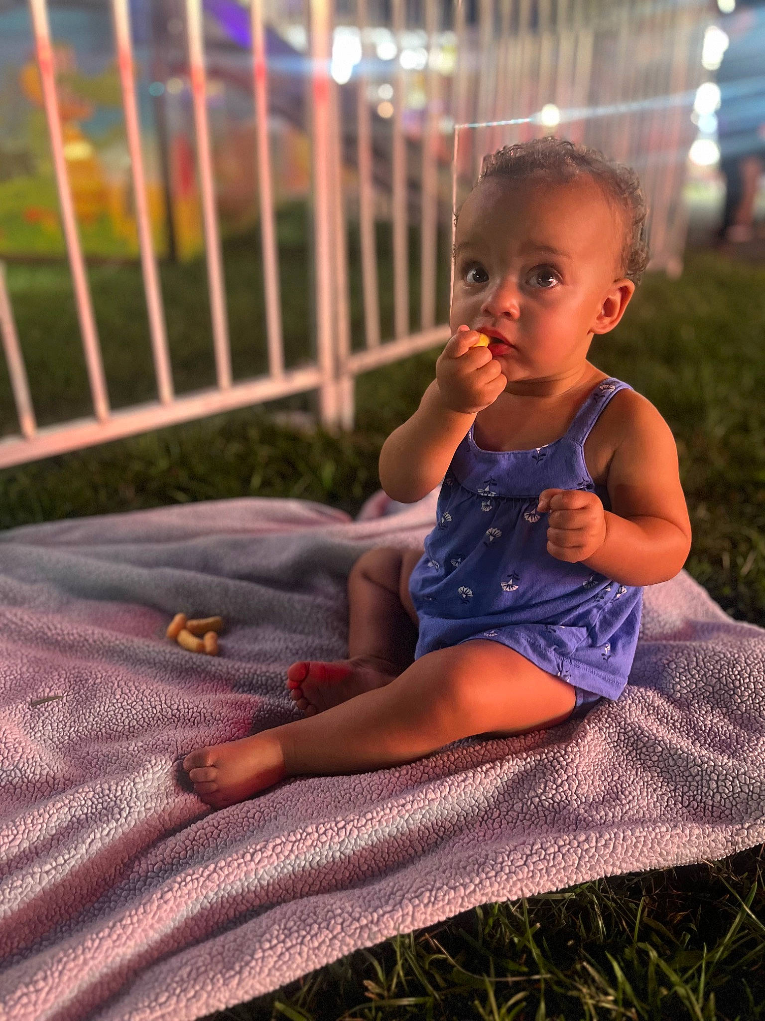 Cora joined the competition — help win amazing prizes! baby, baby_toddler_clothing, barefoot, beauty, child, facial_expression, fence, finger, flash_photography, foot, fun, grass, happy, human_leg, leisure, people_in_nature, person, purple, sitting, toddler