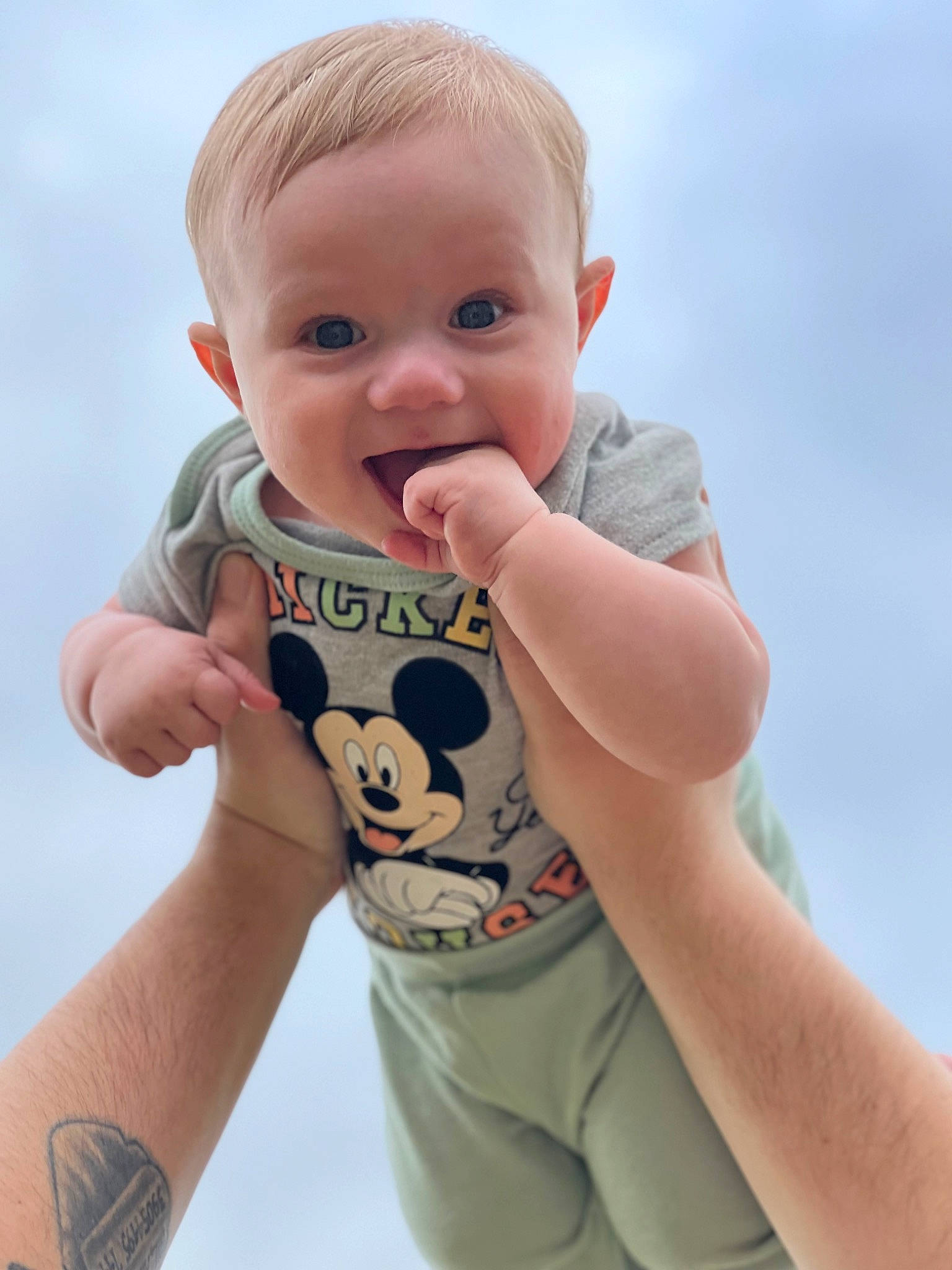 Harrison joined the competition — help win amazing prizes! arm, azure, baby_toddler_clothing, cheek, chin, cool, drinkware, eye, finger, gesture, hand, happy, lip, neck, nose, person, skin, sky, sleeve, smile